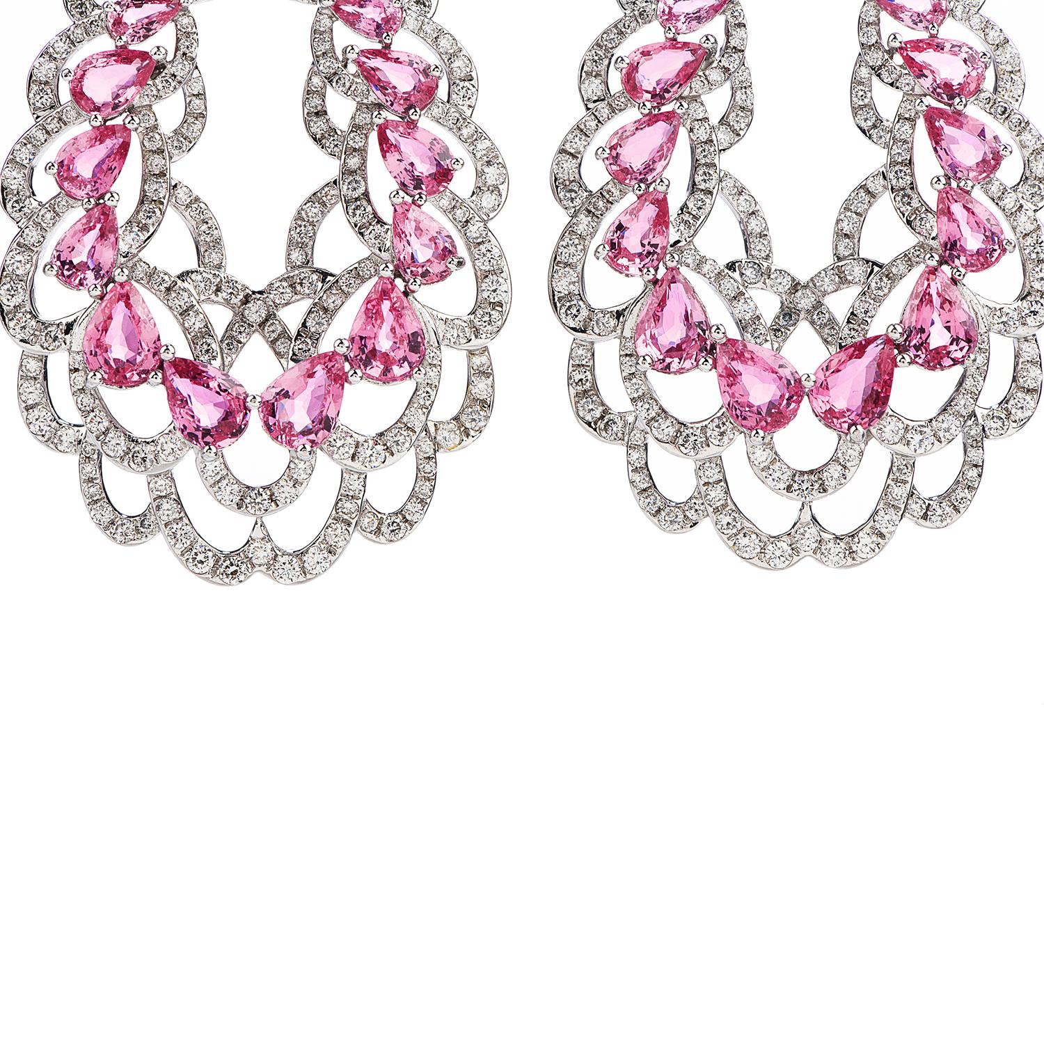 floral open design large dangle earrings, perfect for spring & summer.

Crafted in solid 18K white gold,

This piece has (36) Pink Sapphires, pear cut, prong set, weighing a total of approximately 16.48 carats,

Complimenting the look are 416