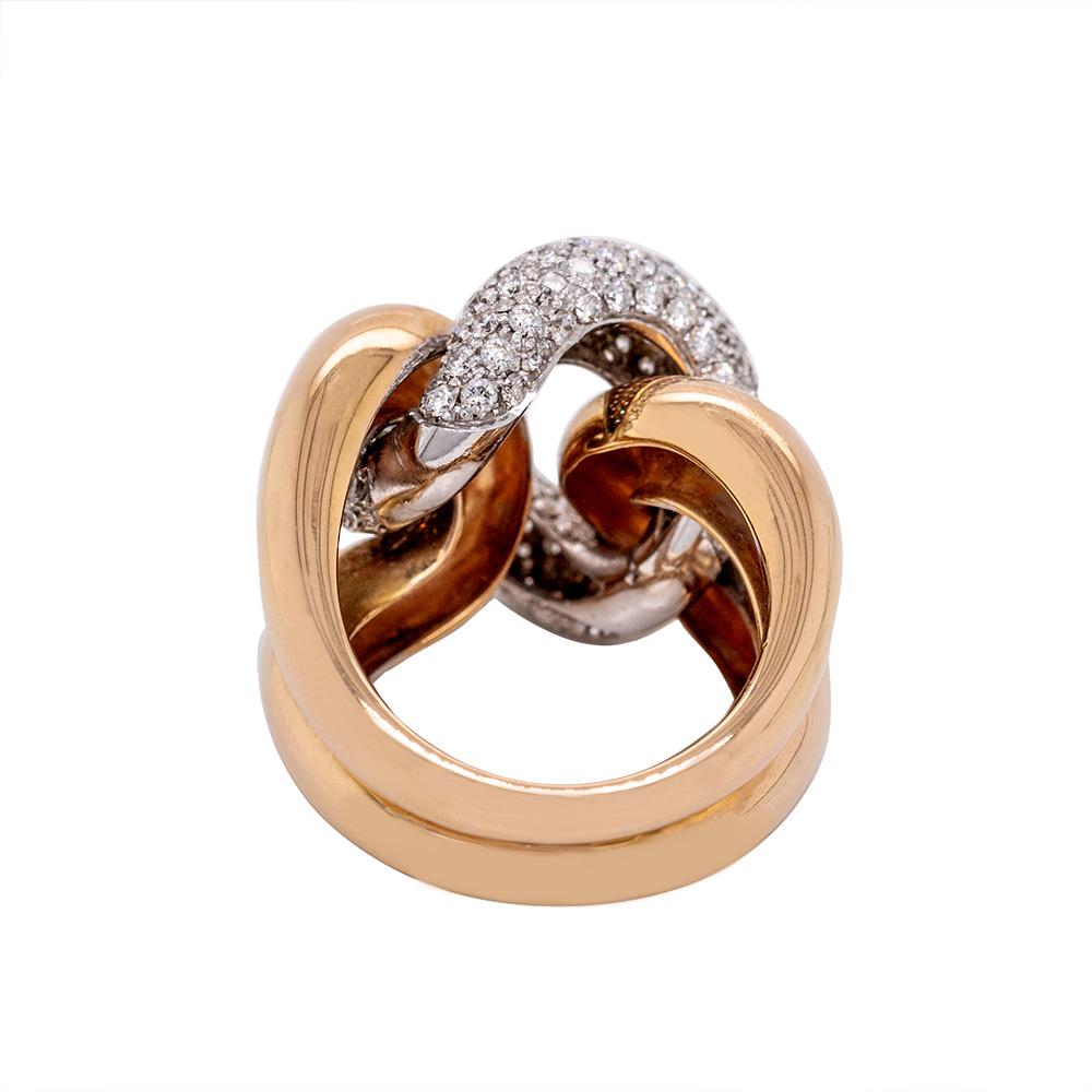 This 18-karat rose and white gold and diamond cocktail ring is sleek and modern. Designed as an oversized curb link, it features 2.42 carats of brilliant-cut white pavé diamonds rated G VS set into white gold.  

Measuring 2 cm wide and weighing
