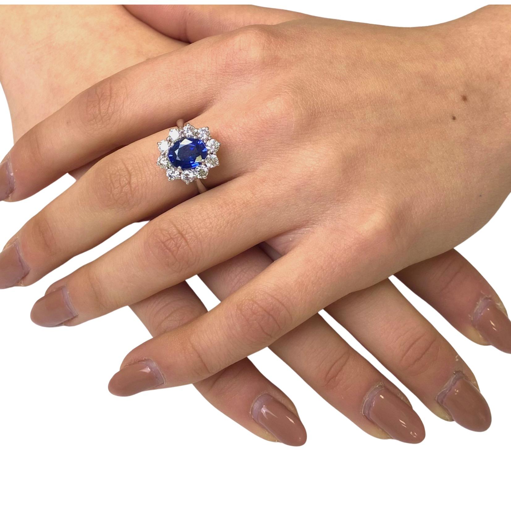 Introducing a magnificent masterpiece that combines the allure of an exquisite blue sapphire with the brilliance of white diamonds, behold this captivating 18-karat white gold ring. Meticulously designed to perfection, this ring is a symbol of