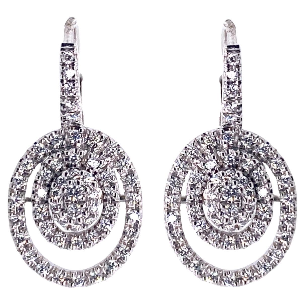 Boucles d'oreilles 21e siècle en or blanc 18 carats avec diamant G-VS de 0,64 carats en vente