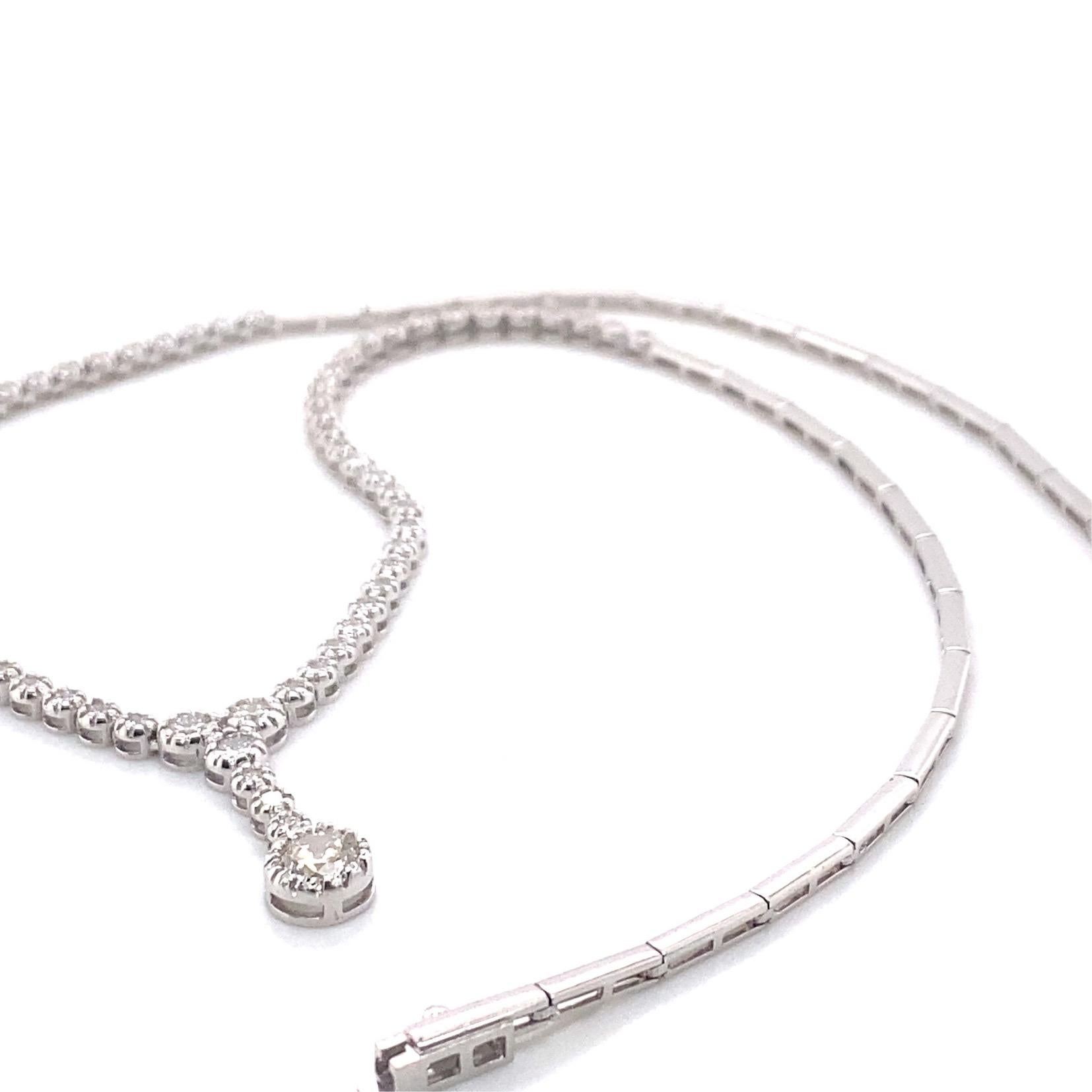 An elegant statement piece. The necklace contains 2.88 carats of white diamonds rated F/G VVS set into 18-karat white gold. It has been hand-made using traditional methods and was designed and produced in Palermo, Sicily by master jewellers. 

The