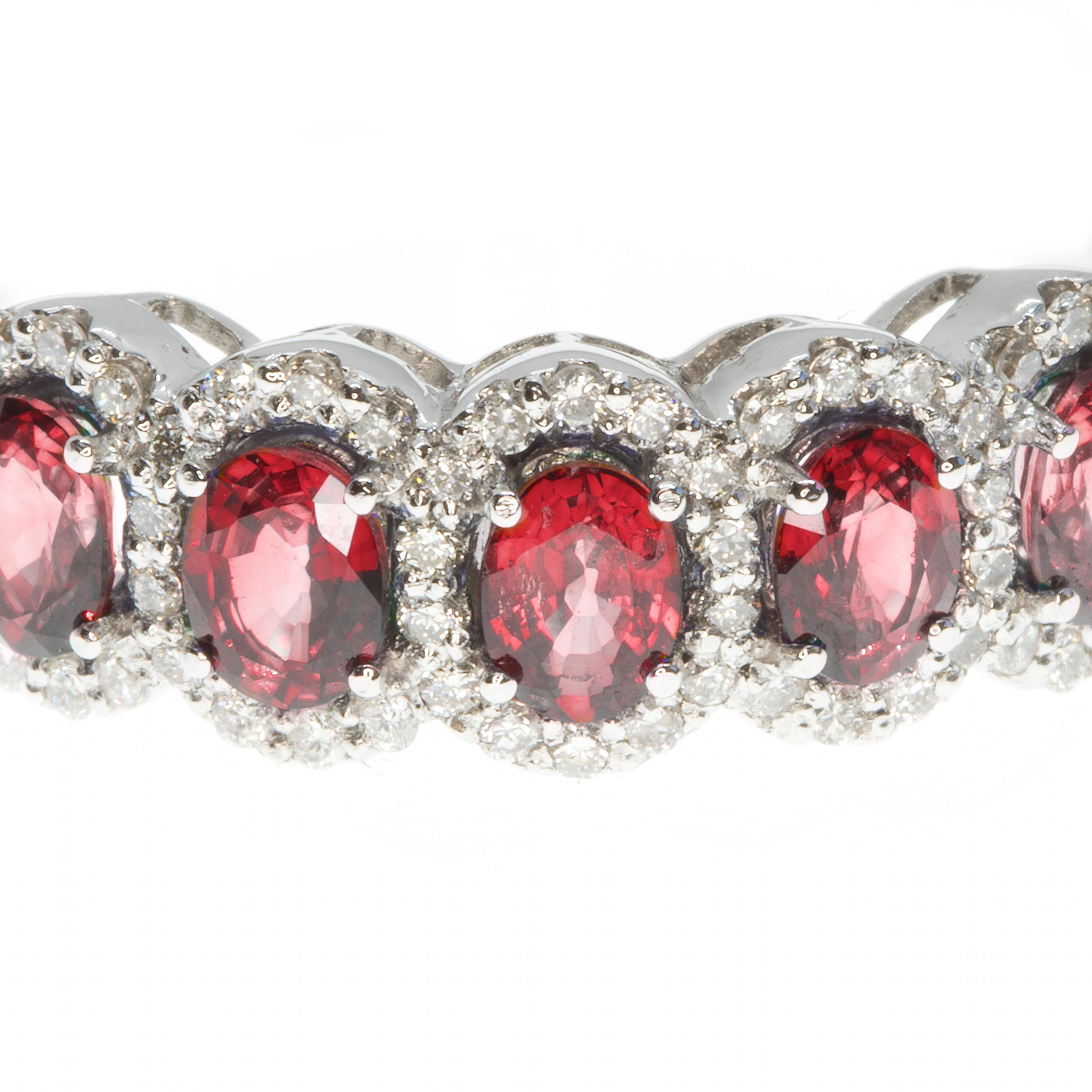 A beautiful ring, masterfully created entirely by hand and featuring carefully selected rubies and white diamonds. The ring has been made from 18-karat white gold.

The ring is equally beautiful on its own or as the jewel of a stack of rings. The