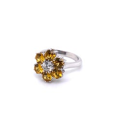 21st Century 18 Karat White Gold, F/G VVS Diamond and Yellow Sapphire Ring