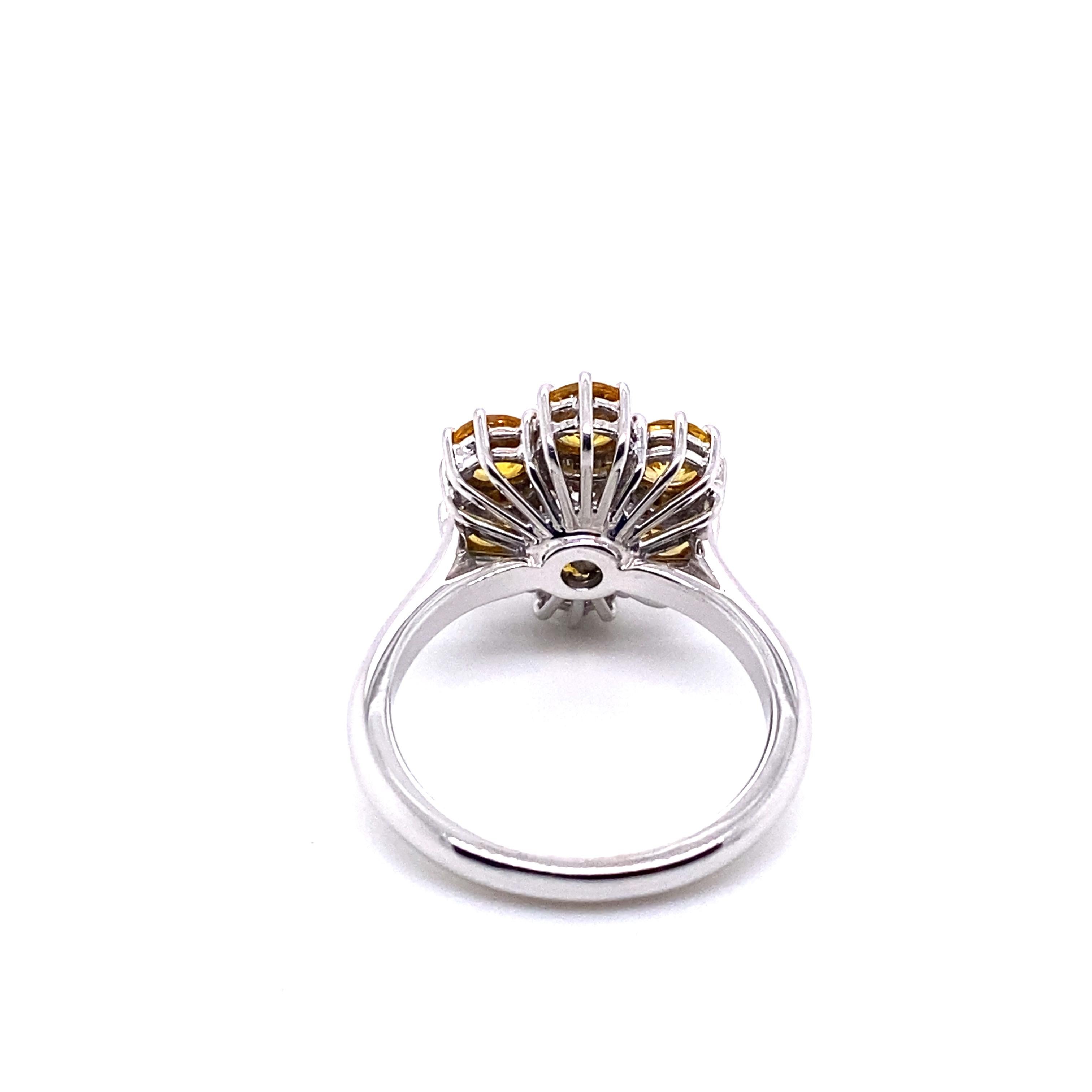 Round Cut 21st Century 18 Karat White Gold, F/G VVS Diamond and Yellow Sapphire Ring For Sale