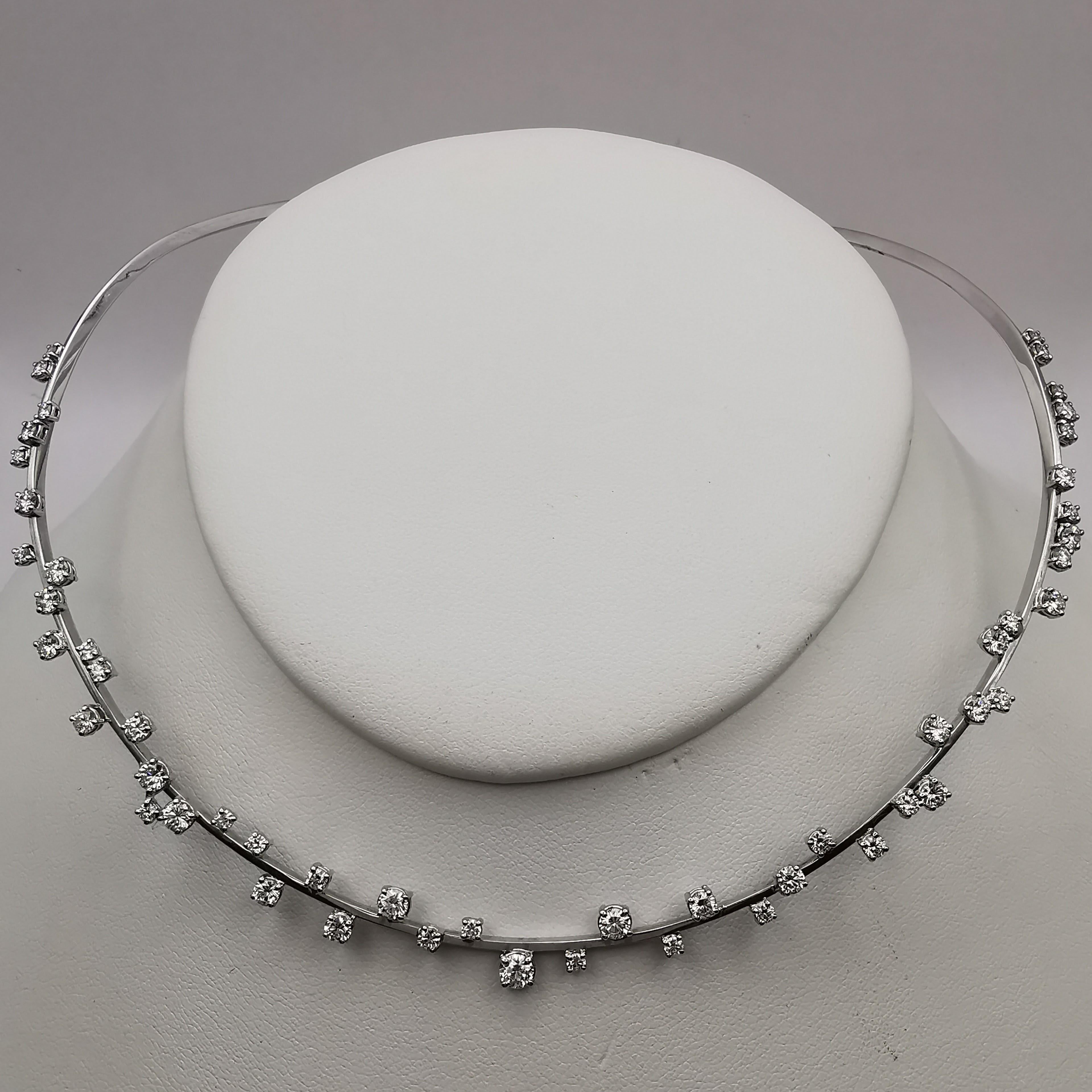 This stunning 21st century 3.33 carat diamond choker necklace is the perfect choice for anyone who loves diamonds and elegant jewelry. The necklace is made of high quality 18k white gold and features a beautiful and intricate design that is sure to