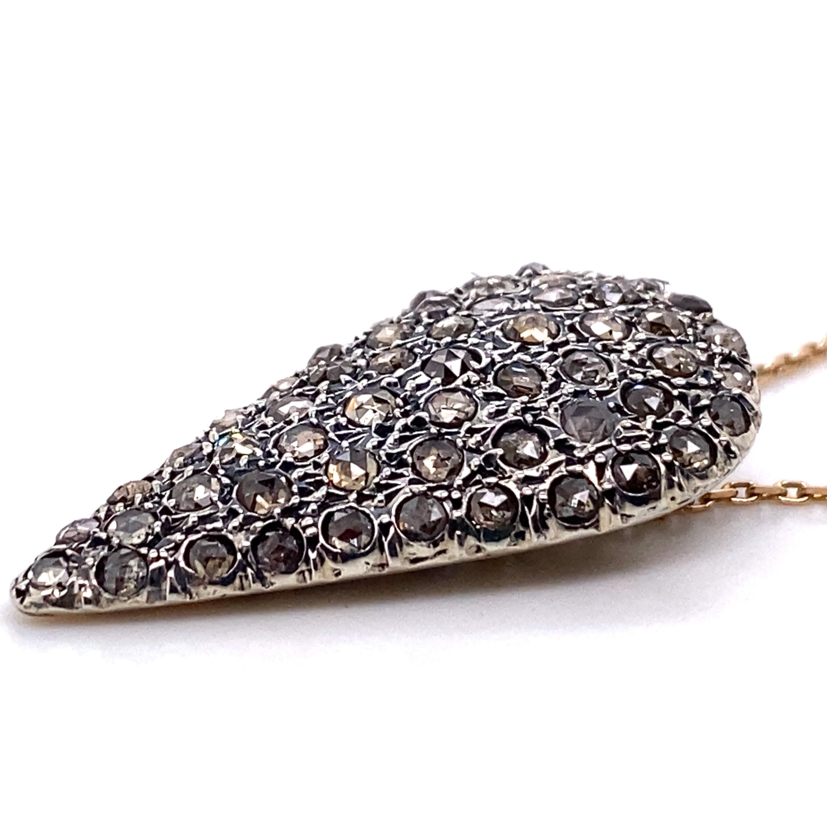 Understated and elegant, and yet 600-odd years in the making, this rose gold and .925 silver, pear-shaped pendant is produced using an ancient Albanian technique that was brought to Palermo in the fifteenth century. 

In this piece, carefully