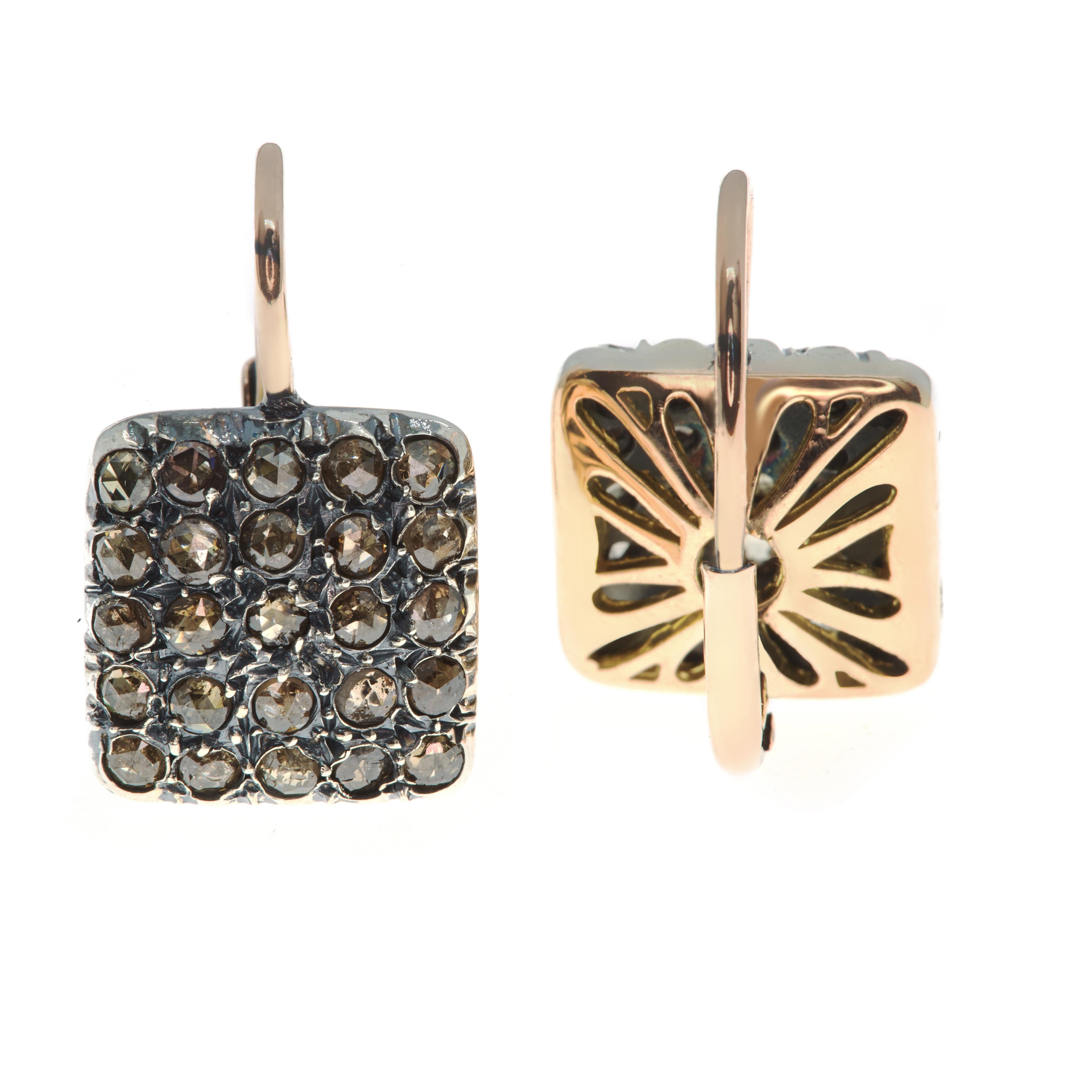 Modern-looking in their simplicity and yet 600-odd years in the making, these 9-karat rose gold and blackened .925 silver earrings are produced using an ancient Albanian technique that was brought to Palermo, Sicily in the fifteenth century.