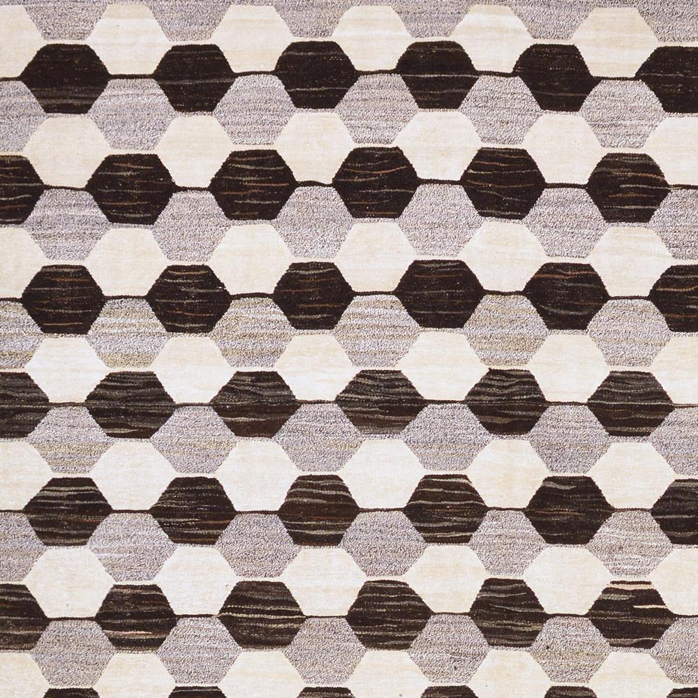 21st century abstract handwoven anatolian vintage wool cotton Kilim

This special Kilim from Turkey was handwoven with vintage wool and cotton in the last few years. The many light hexahedrons contrast with the grey and dark brown ones. It fill