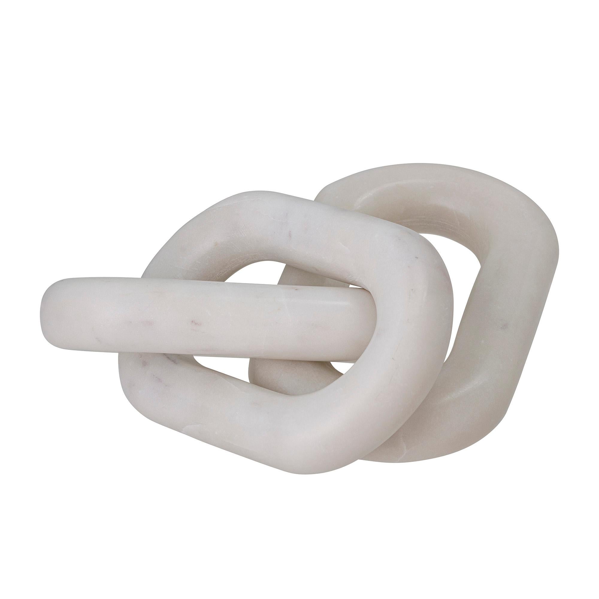 Organic decorative table top sculpture hand carved from white marble with a honed finish, this piece is composed of three interconnected looping rings that can arranged in variable positions. This small decorative sculpture has an interesting