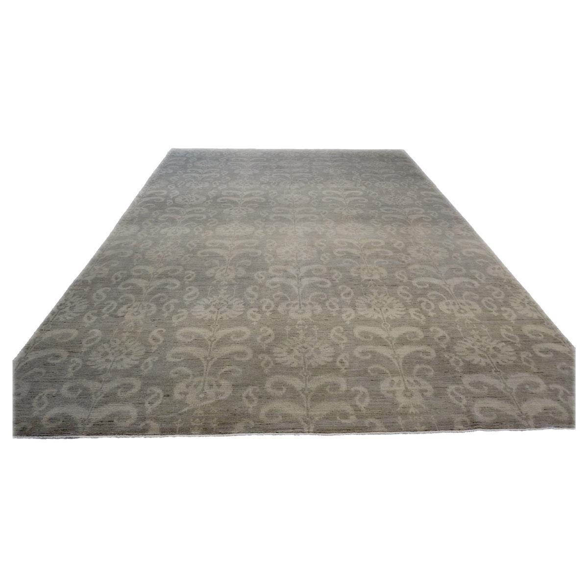 This 21st Century Afghan Ikat Wool Handwoven 9x12 Grey Carpet was made with 100% hand twisted wool fibers which were vegetable dyed with subtle colors. The weaver intentionally made the borderless rug so it can be universally placed in a room