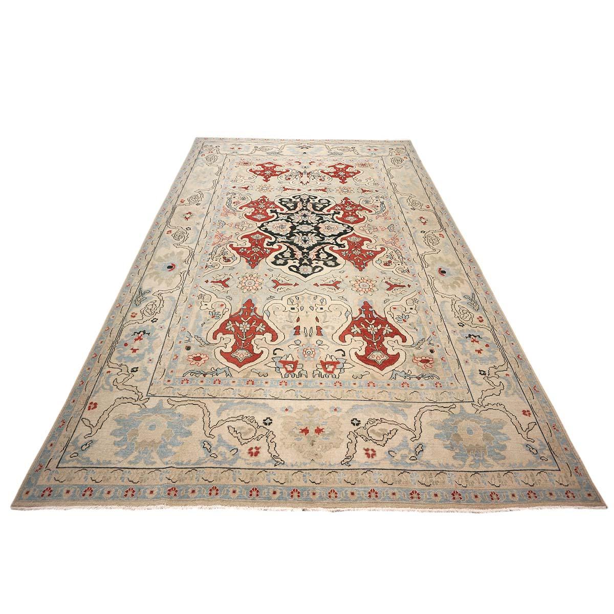 Ashly Fine Rugs presents an antique recreation of an original Persian Sultanabad room-sized area rug. Part of our own previous production, this antique recreation was thought of and created in-house and handmade in Iran by our master weavers.