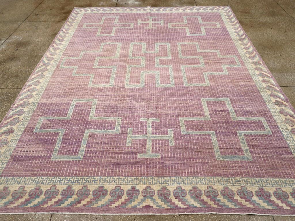 Una alfombra moderna del tamaño de una habitación de Khotan del Turquestán Oriental, hecha a mano durante el siglo XXI.

Medidas 9' 0