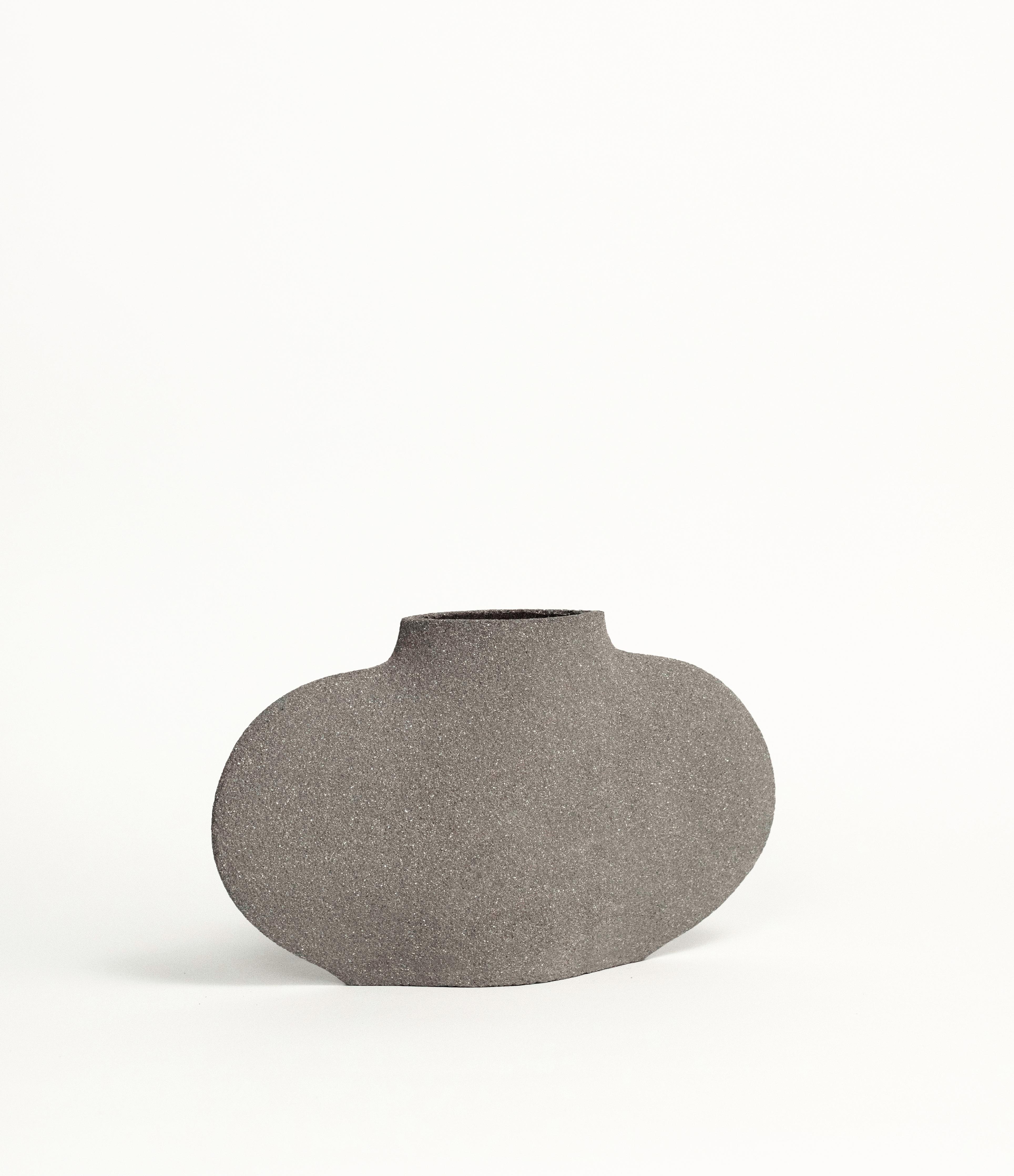 Ailes N°2 - Grey

Hand-crafted in our studio in France.

Measures: H: 14 CM / L: 24 CM
H: 5.5 INCH. / L: 9.5 INCH.

- Stoneware fired at high temperature finished with transparent glossy glaze inside.
- Raw exterior showcasing the natural
