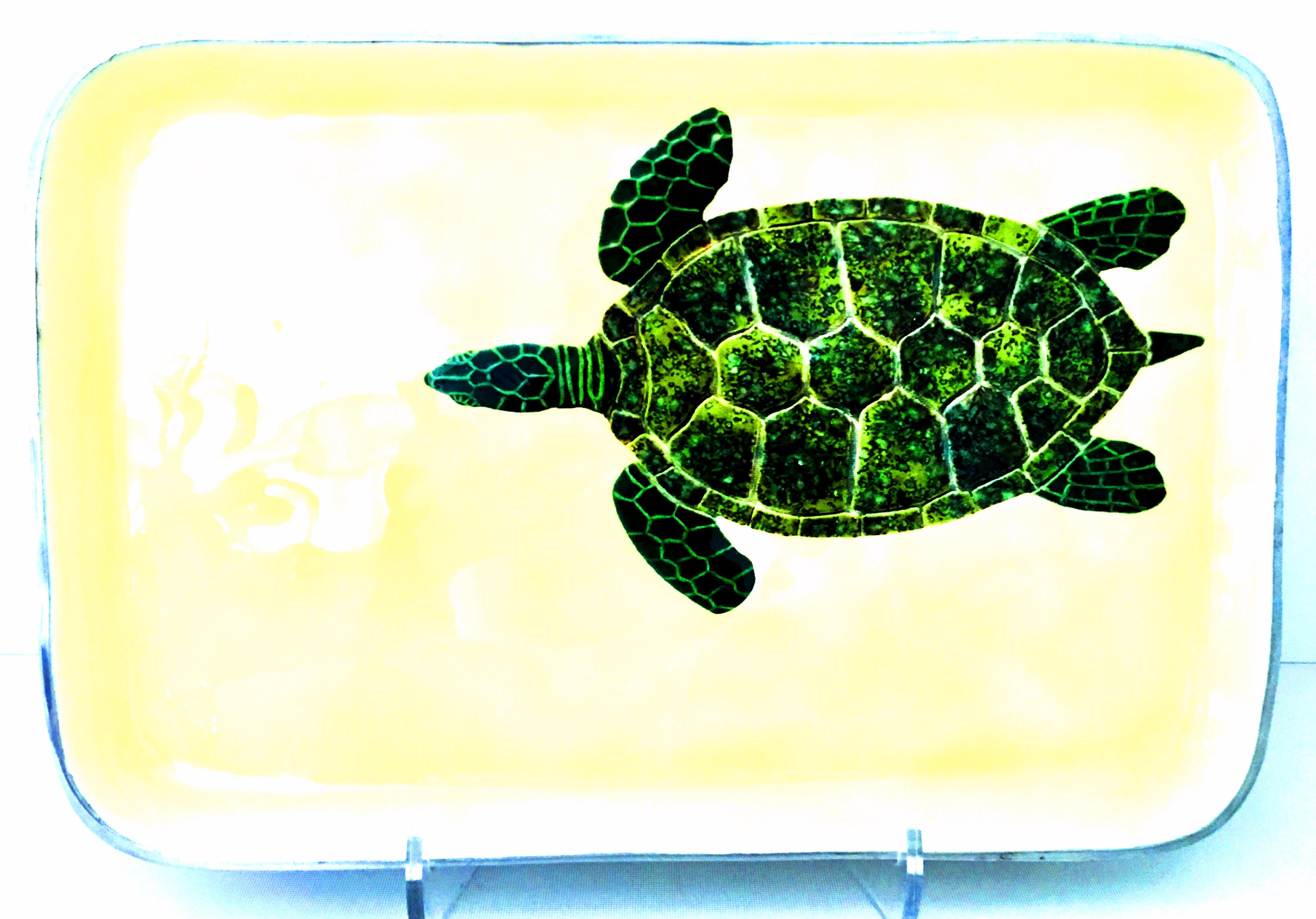 21st century aluminum and enamel rectangular turtle tray. Features a polished aluminum base, painted enamel cream ground with shades of green turtle.
Hand wash only.