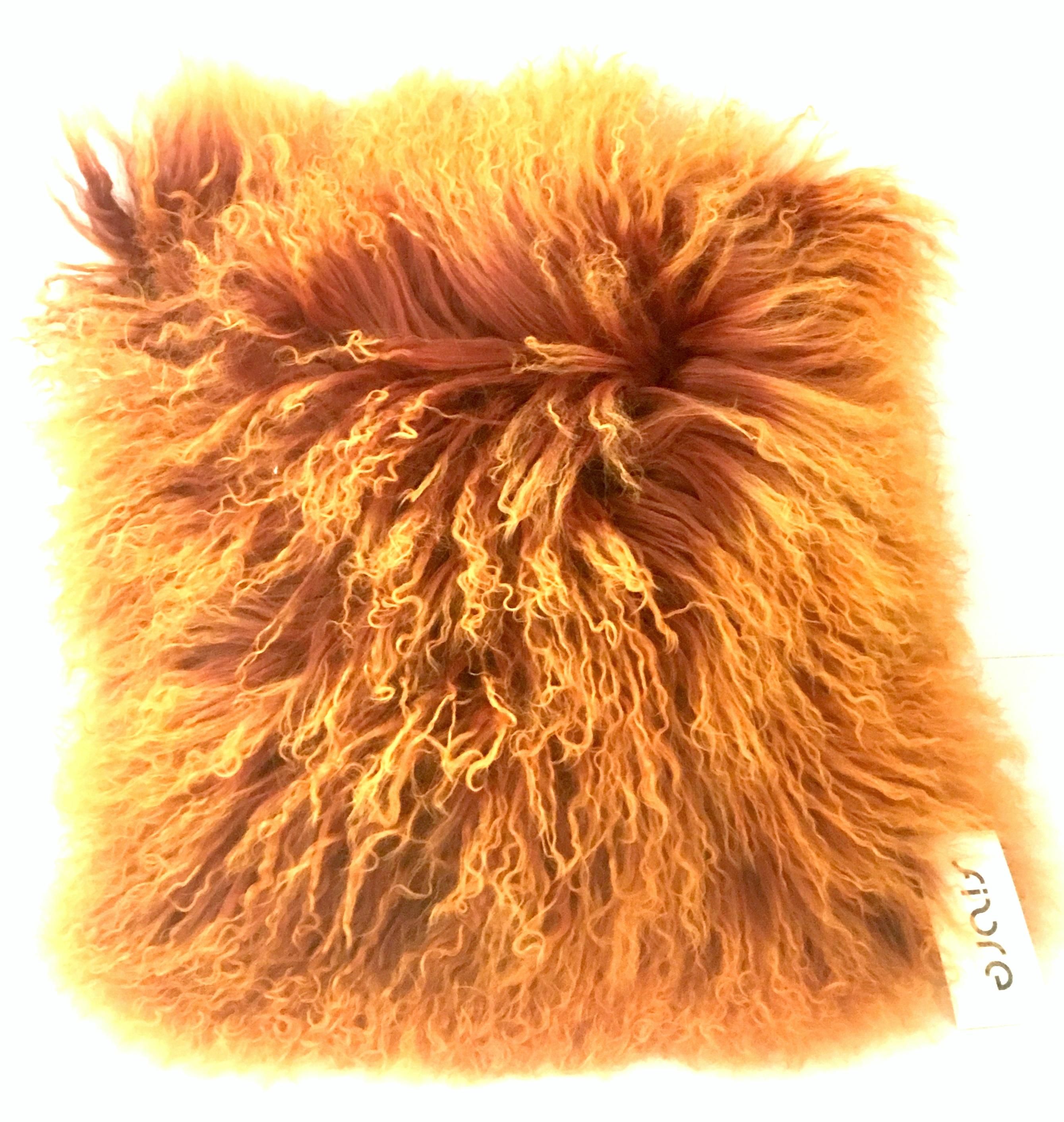 21st century and new Australian sheepskin orange long curly hair fur pillow by, Auskin. Includes a new cotton blend insert. The chocolate brown ultra-suede back panel has a hidden zipper for easy removal. The original manufacturer tag is present.