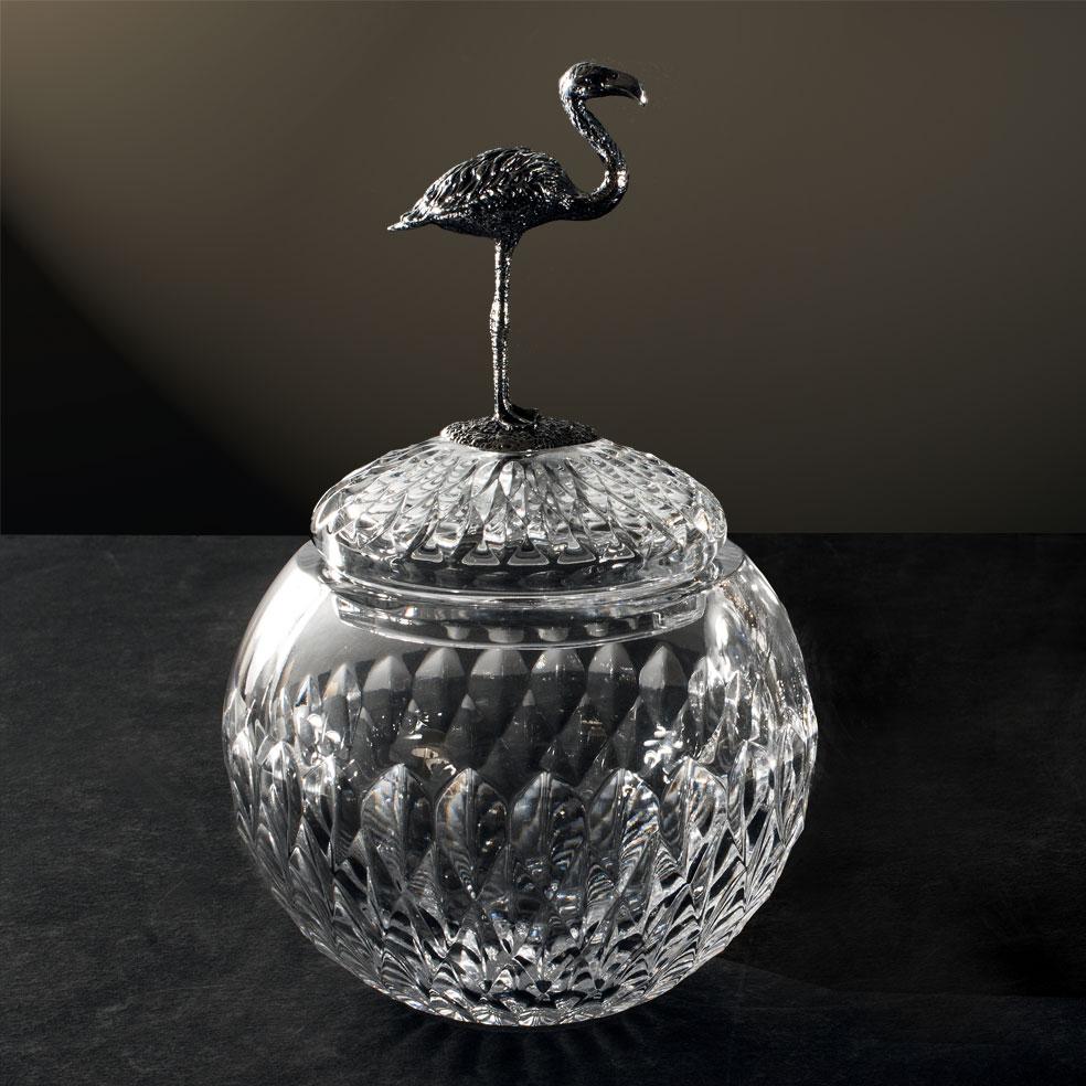 Hand carved crystal box with Flamingo in brass made with the artisan lost wax technique with dark burnished finish. Each object is handcrafted and the care for every detail makes each item unique in its kind. 
The style of this box is a modern