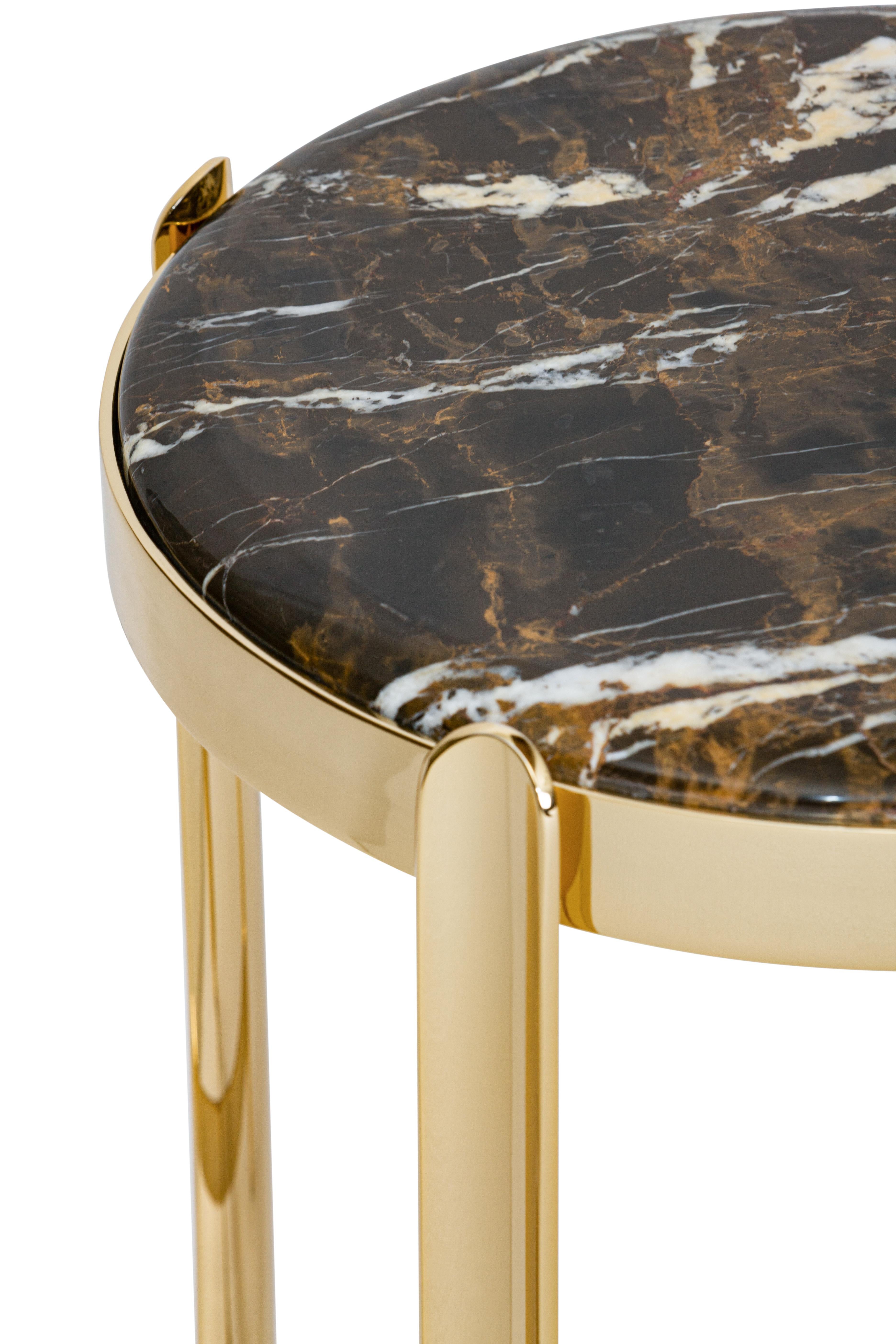 21st Century Art Déco Elie Saab Maison black & gold marble side table, Italy

Named after its strategic position in interiors, the Zenith low tables and consoles add a refined and contemporary glamour to each room. Series of low tables, consoles and