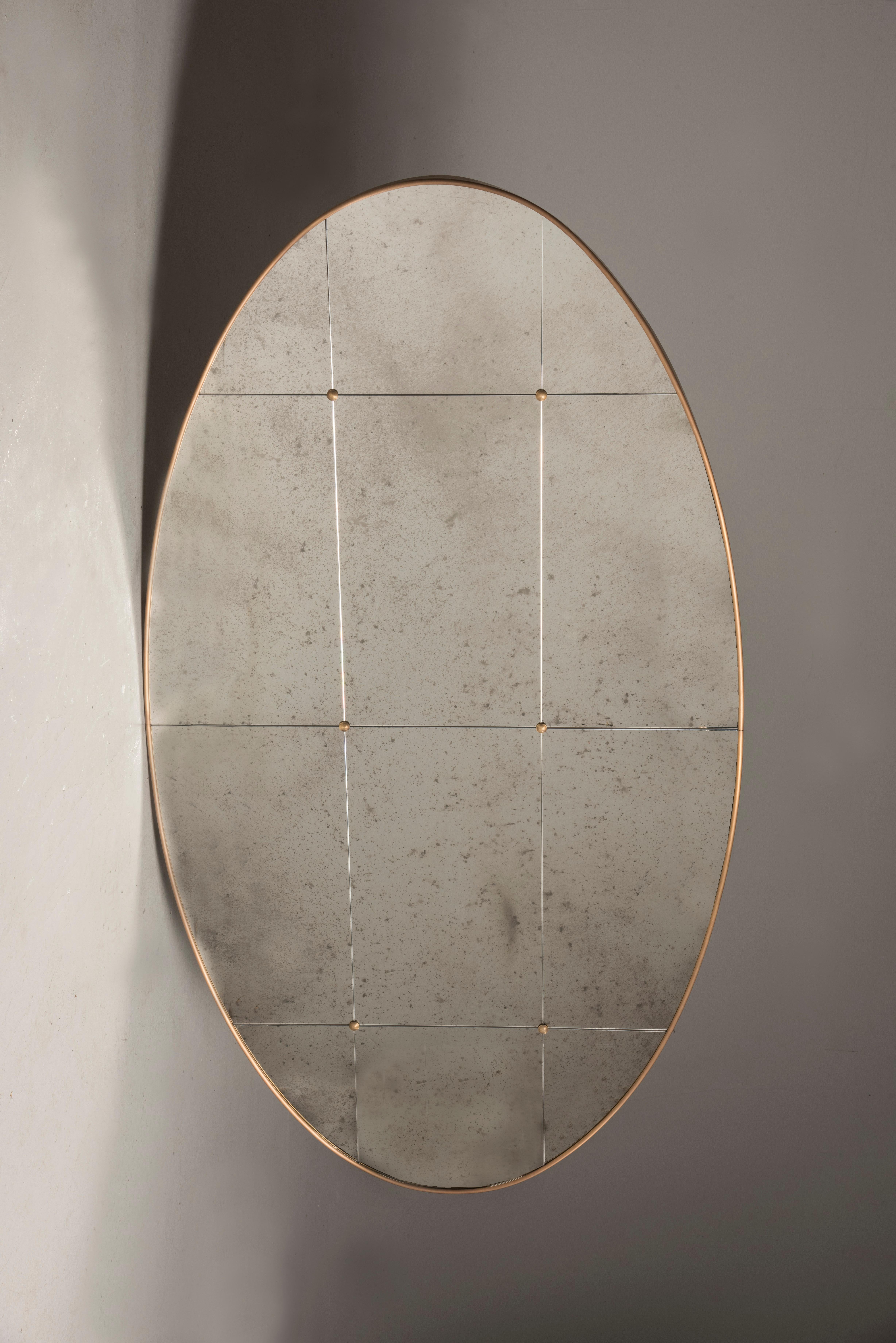 Italian 21st Century Art Deco Style Brass Frame and Studs Paneled Distressed Mirror For Sale