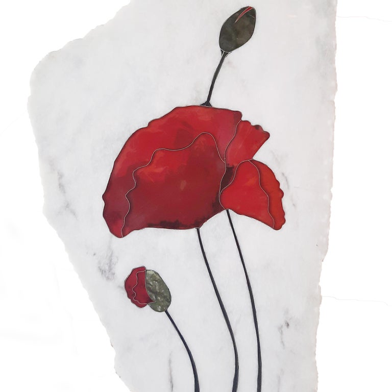 The Reidi Collection takes its name from the Persian word for the poppy flower - marrying traditional craft techniques with contemporary design and innovative application. The motif, inlaid on white marble, combines the 16th century Italian stone