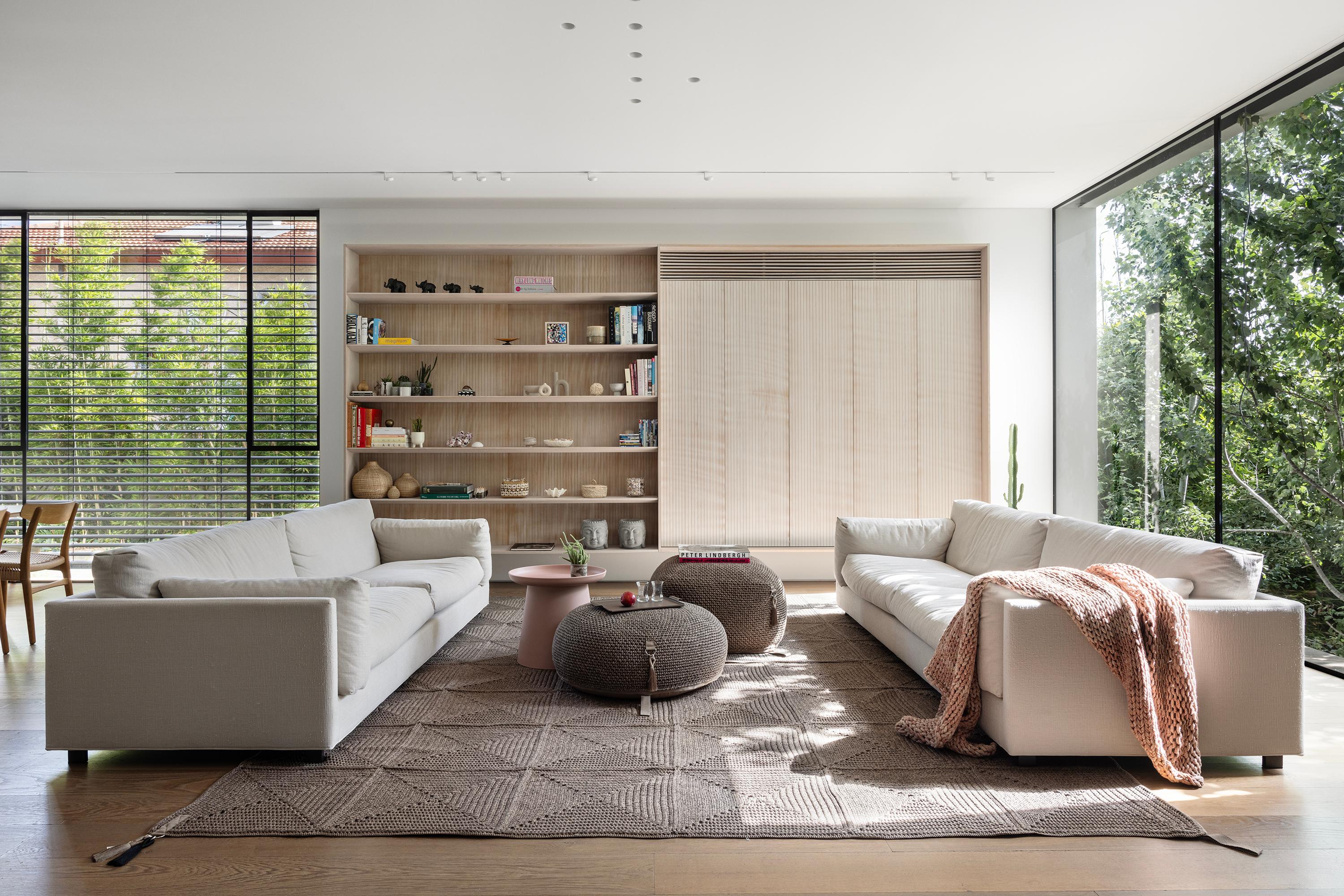 The Classic crochet granny square takes a contemporary twist in this outdoor rug. Large squares form the rug, framed with bespoke webbing. Handmade from UV protected bespoke iota yarn in earth tones, the textile is soft, yet durable and suitable for