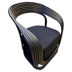 Fauteuil contemporain en rotin noir « 21st Century », IDN 2025