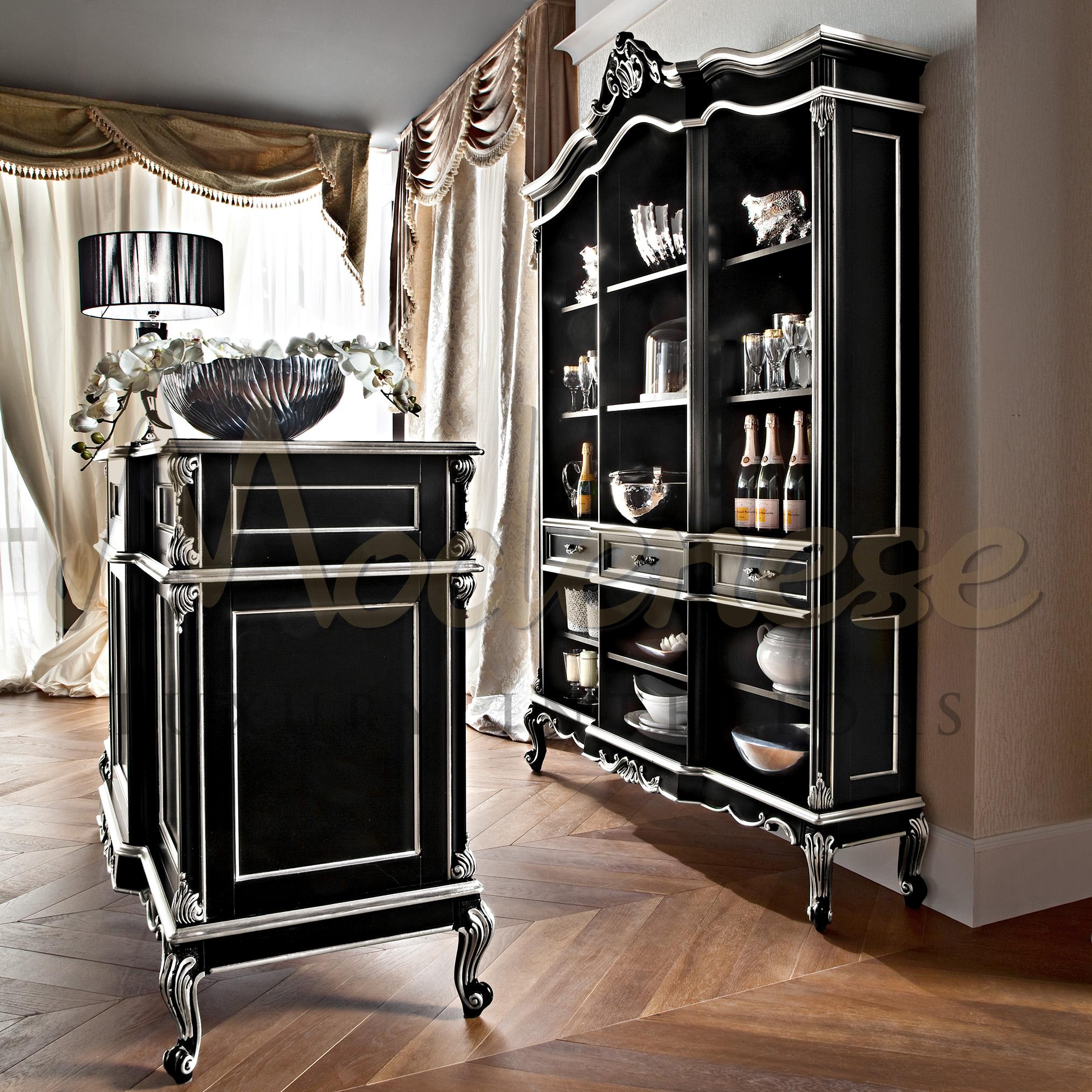 Racks and shelves are not at all a problem for Modenese Gastone Luxury Interiors. Admire this spacious bar vitrine in black lacquered finish and silver leaf, with 15 wide open spaces for drinks, bowls, barware and bottles, and 3 drawers for towels