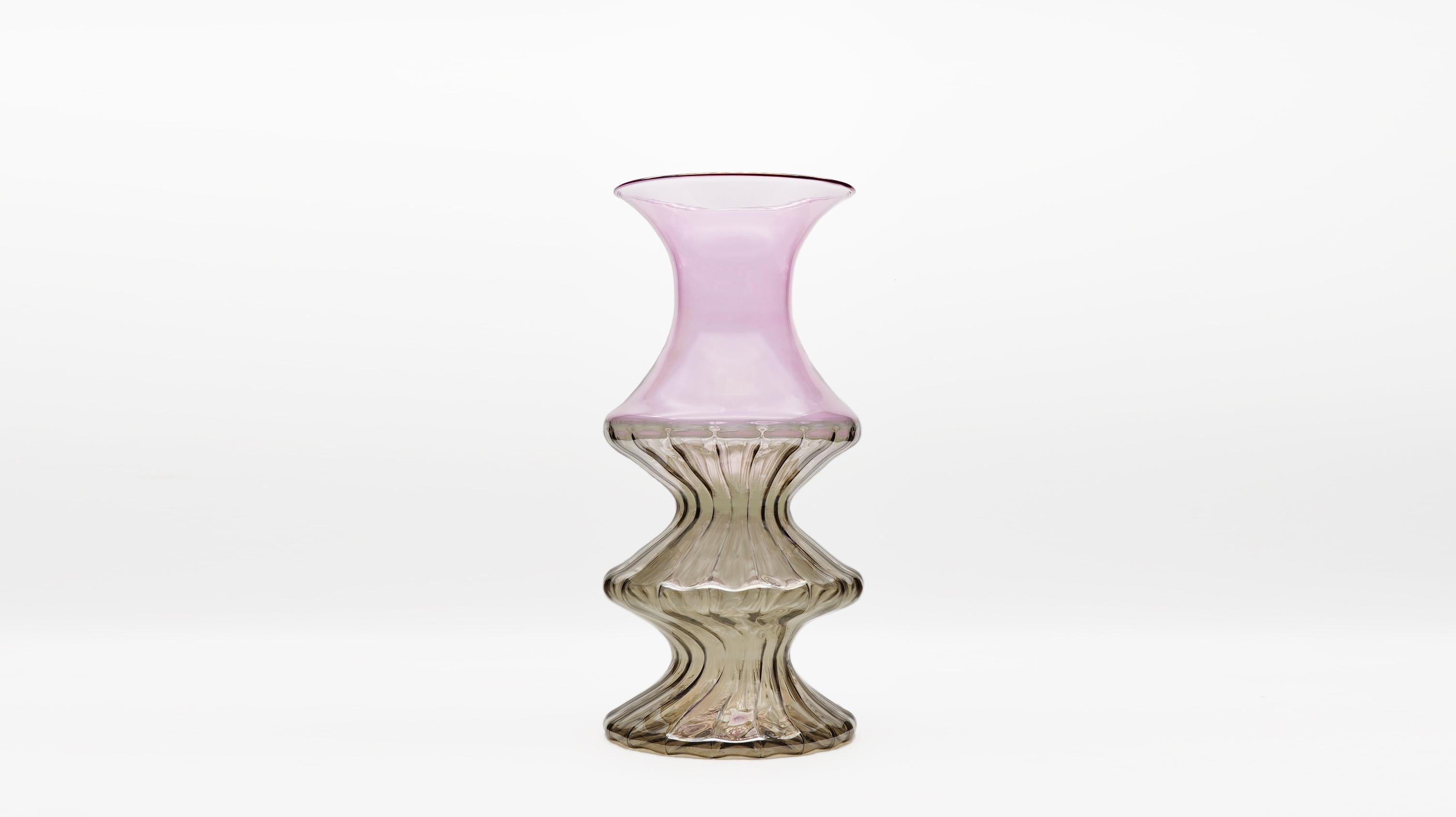 The Madame collection reinterprets traditional Venetian vases, their refined details and delicate colors. The shape comes from the decomposition and composition of the typical flaring, which repeated creates ever-changing shapes but each