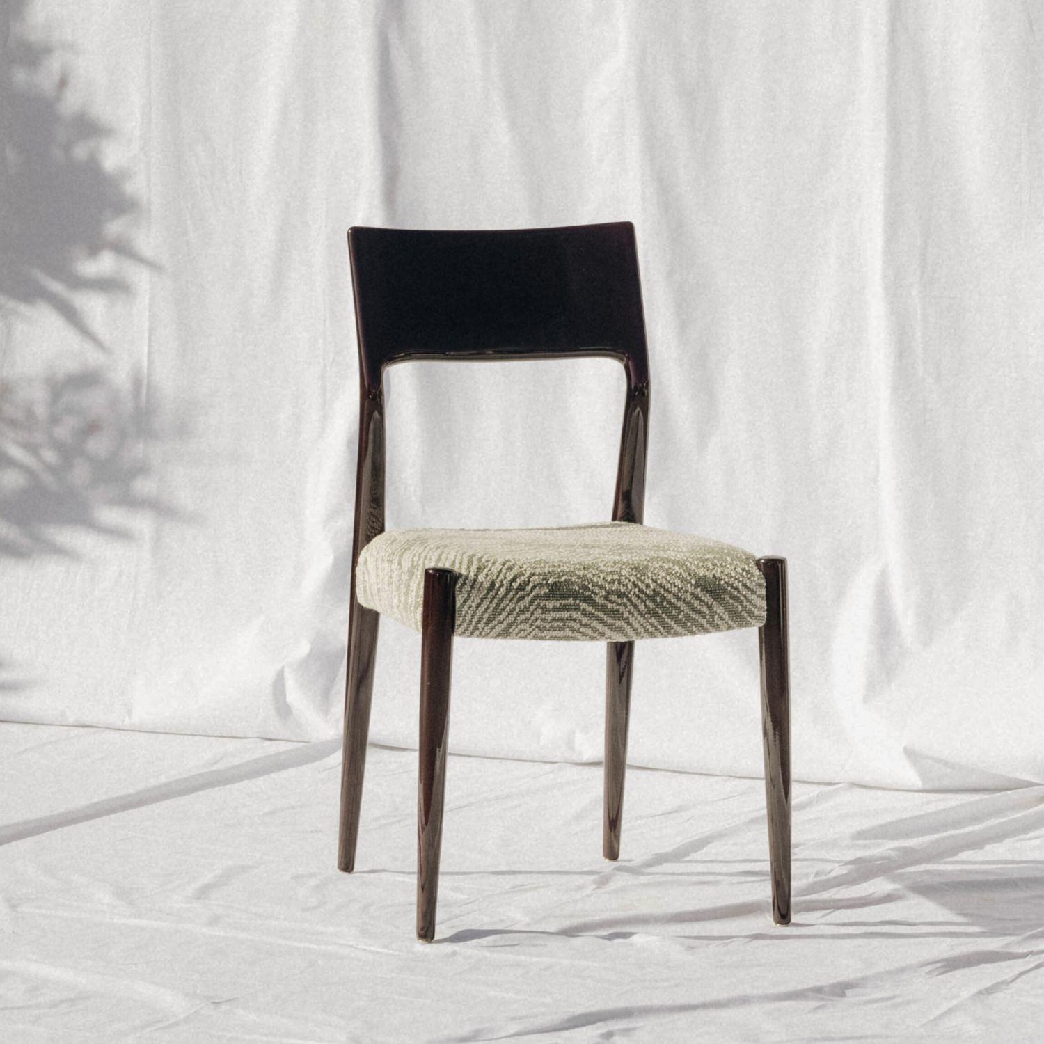 Bossa Chair, in Mahogany Wood, Handcrafted in Portugal by Duistt

The “Bossa” collection is inspired by the subtlety, particular charm, and harmonious simplicity of the Brazilian music movement that emerged in the late 50s, “Bossanova”. With