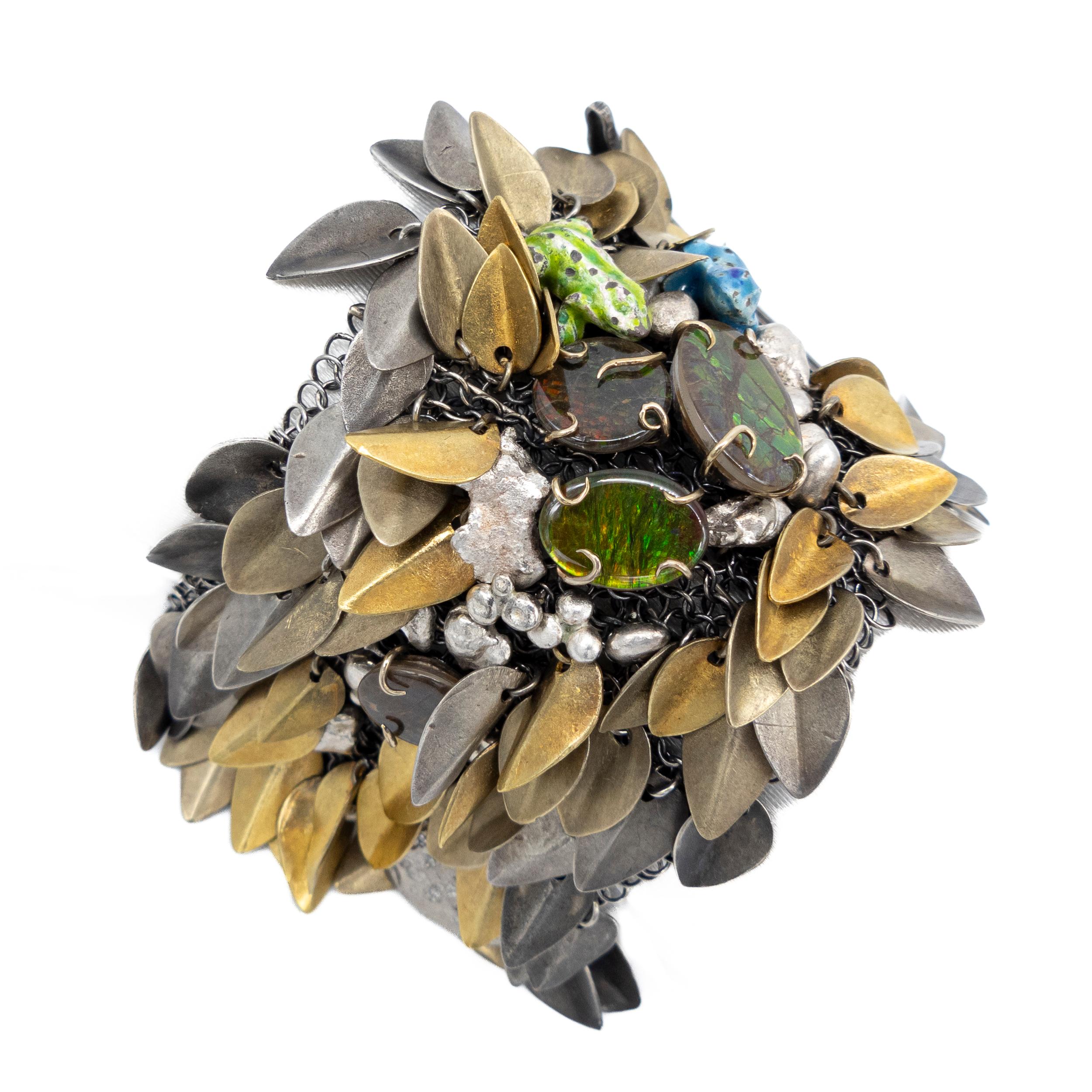 21st Century Bracelet Silver Mesh 18k yellow gold Ammolite Diamonds Frogs

One of the key features of our work is to portray stories, fables, or tales through our jewelry pieces.

In this bracelet, you can witness the Enchanted Forest come to life,