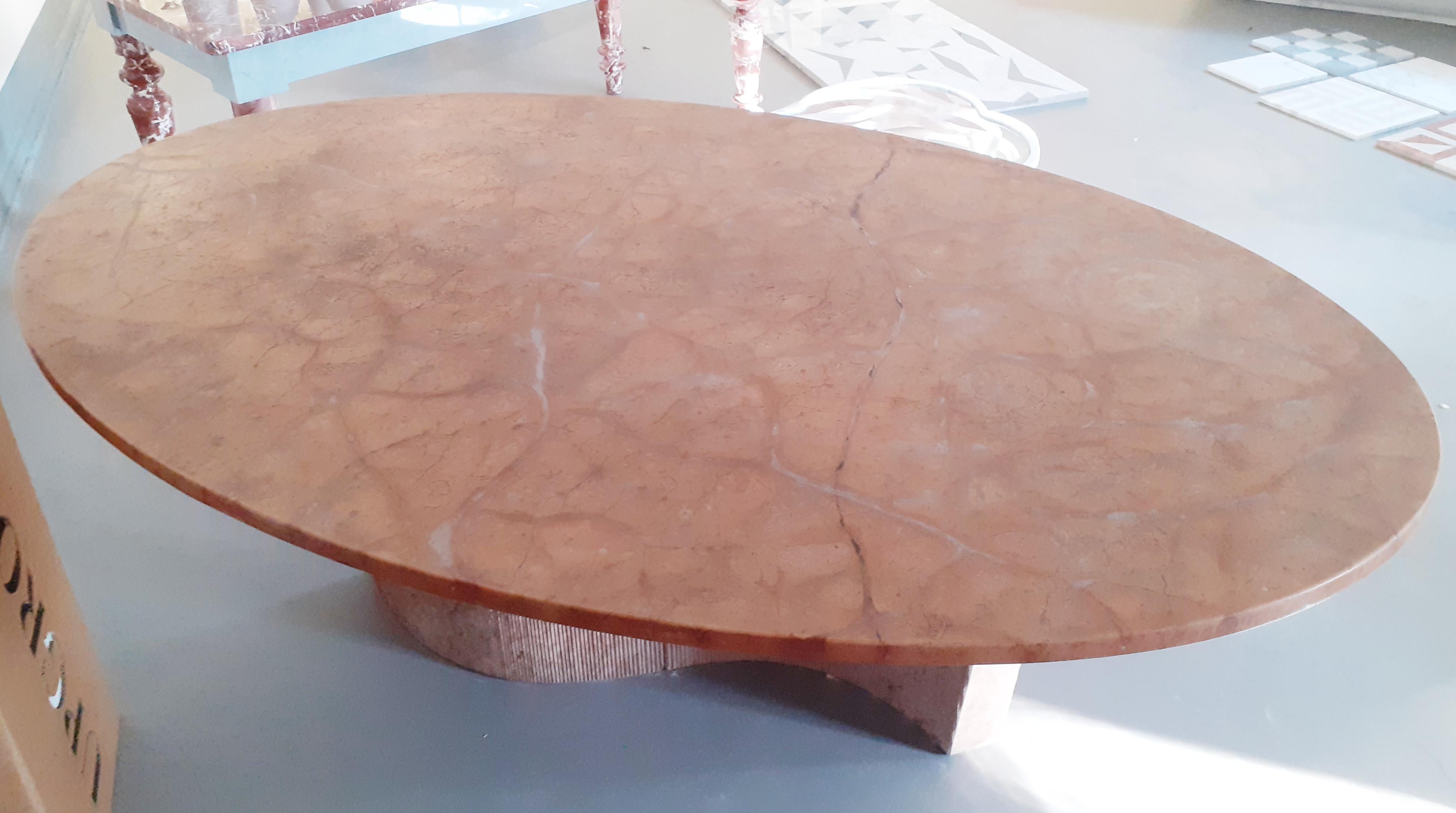 Marble table designed by designer Mario Bellini.

Size: cm.200 x 125 X H 73
Materials: Travertino Nazionale – Bianco Carrara - Rosso Verona
Designed by: Mario Bellini.
