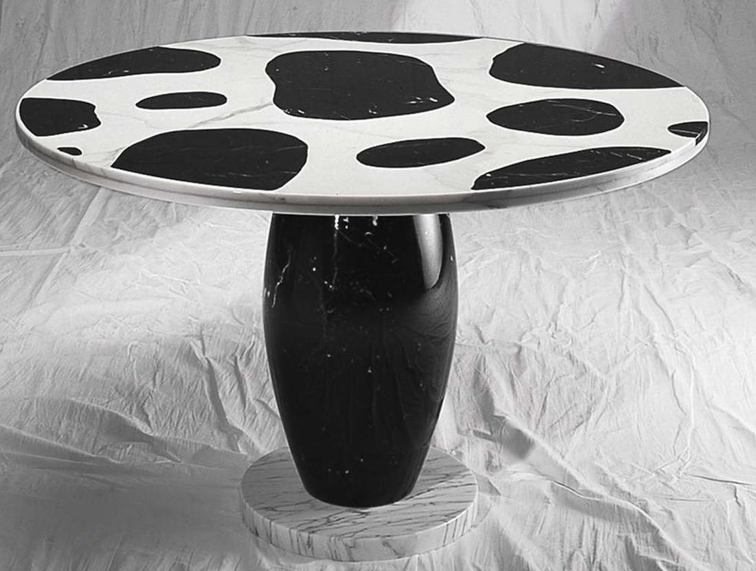 Name: KAMPUR
Marble table designed by architect Michele De Lucchi.
Materials: White Carrara + Nero Marquina
Size: 130 x H 73
Designed by: Michele De Lucchi.

 