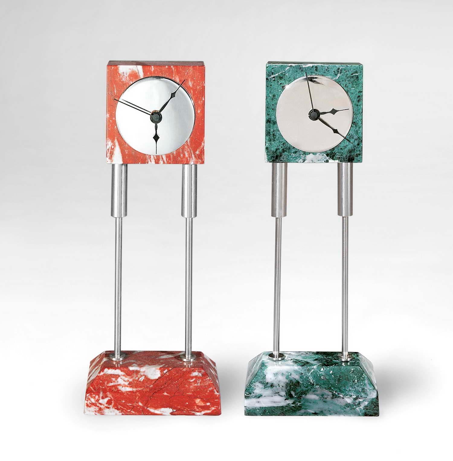 Marble clock designed by Arch. David Palterer.

Size: cm. 10.5 x 6 x 26 H.
Materials: Rosso Francia / Verde Alpi
Designed by: David Palterer.