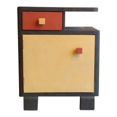 Armadio-scultura del XXI secolo in legno e resina, oro-verde-rosso.