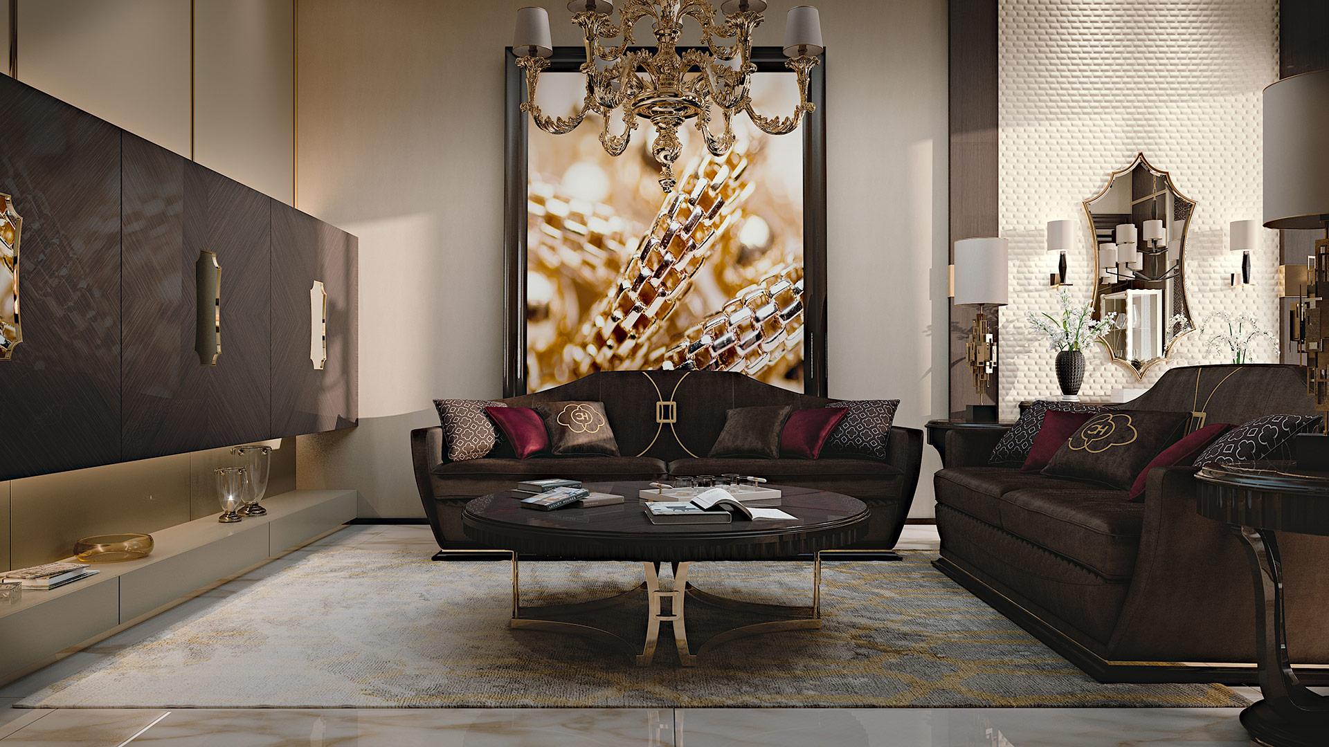 Table basse ronde avec base en métal. Le beau mélange entre le bois de noyer naturel et la base en métal doré est parfait pour un environnement contemporain et luxueux. La combinaison de vers en forme de chevrons du placage sur le dessus donne une
