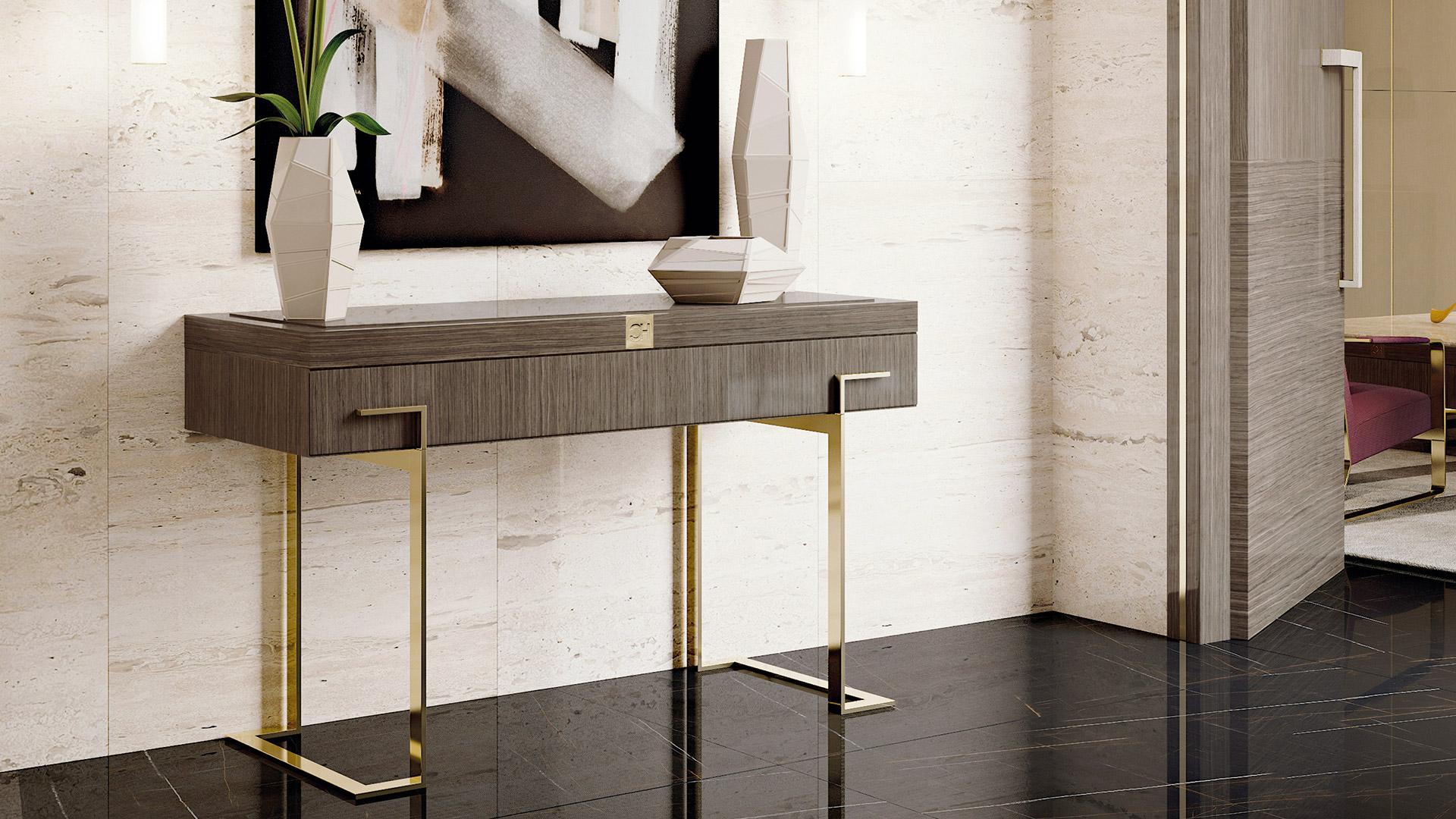 Console with one drawer and metal legs. The beautiful mix between natural Walnut wood and golden galvanic metal details is perfect for a Contemporary and luxurious environment . The opposite verse combination of the veneer on the top gives a touch