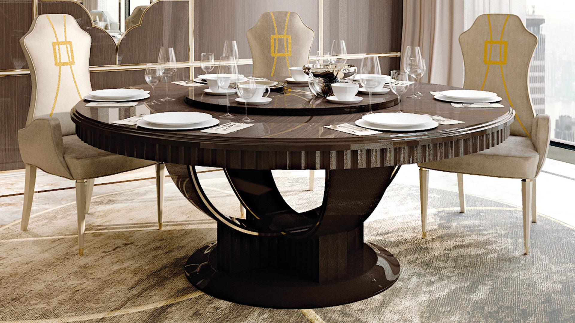 Round table with Lazy Susan turning top. The complexity of the base realized in bended woodmakes this table truly a piece of art. On the top, the typical GLAMOUR Collection decor created by the square and two arches is applied creating a luxury