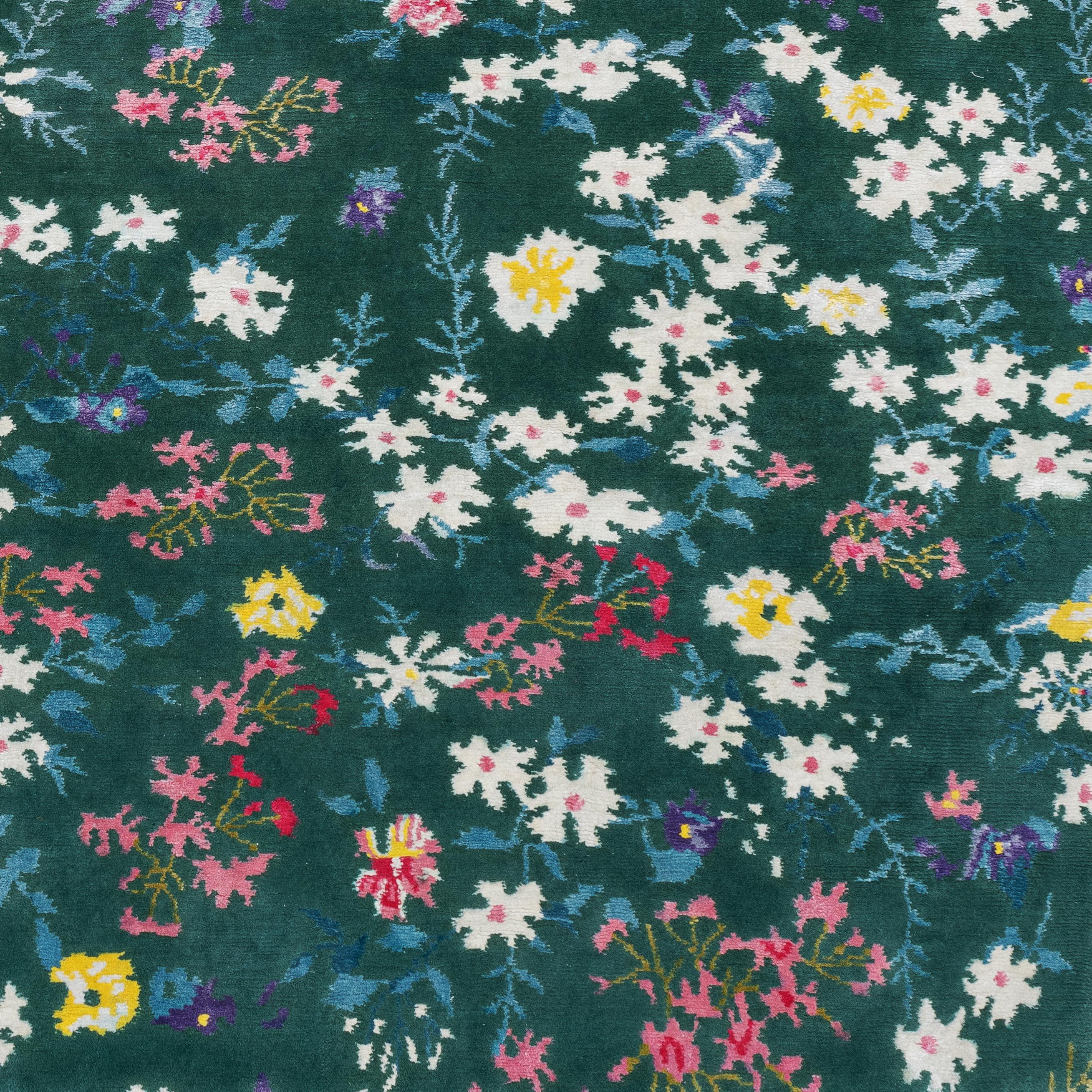 Chloé gives every room a glimpse of nature thanks to its colorful flowery meadow.
This rug is hand knotted in Nepal by our artisans by using 50% silk and 50% fine Himalayan wool dyed using vegetable and mineral pigments. The base is 5 mm high,