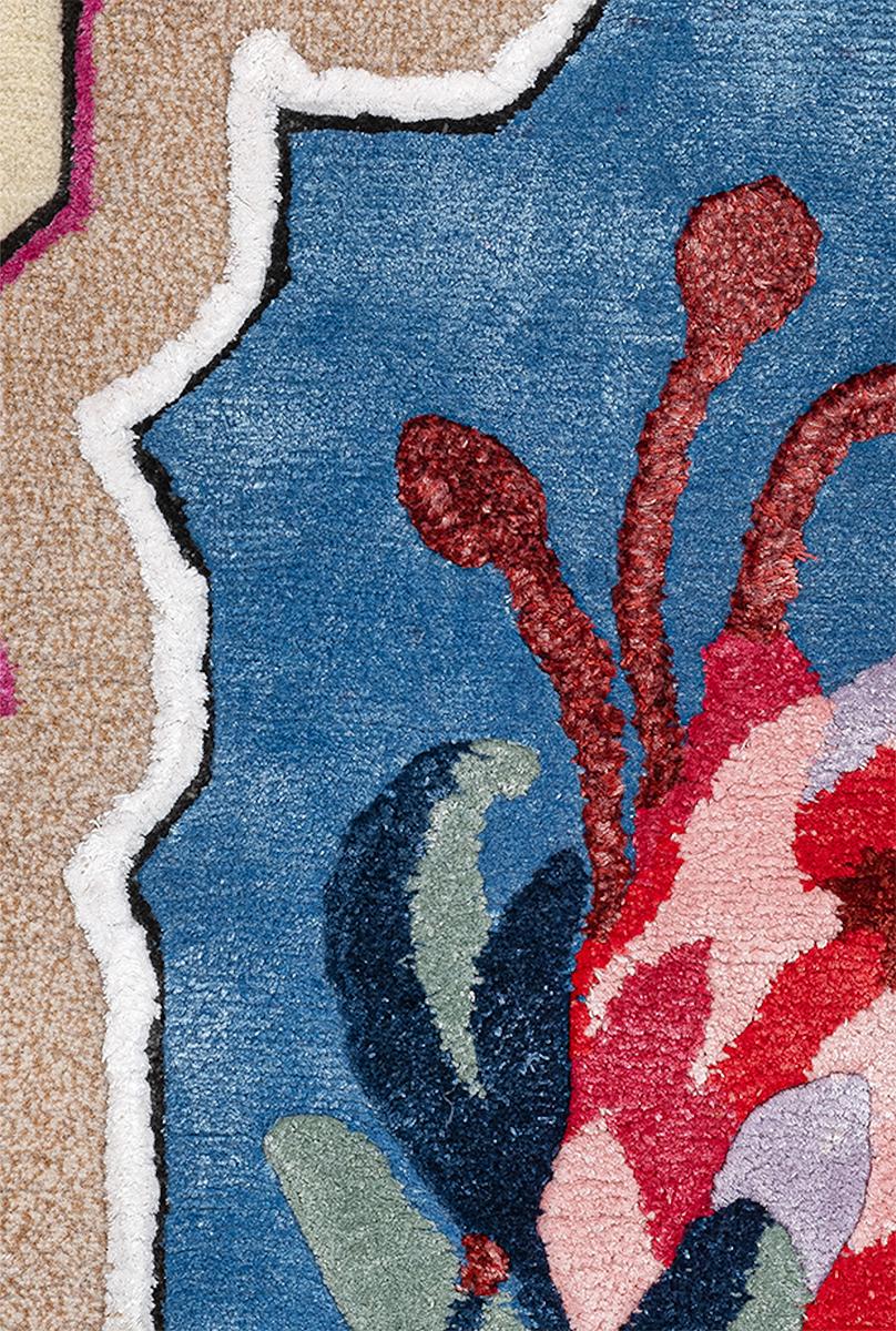It’s a playful hand-knotted rug made with Himalayan wool and natural silk, inspired by flora and organic shapes with vibrant colors and stylistic geometries that reflect artist’s eclectic vision and her personal take on interior design.

This rug