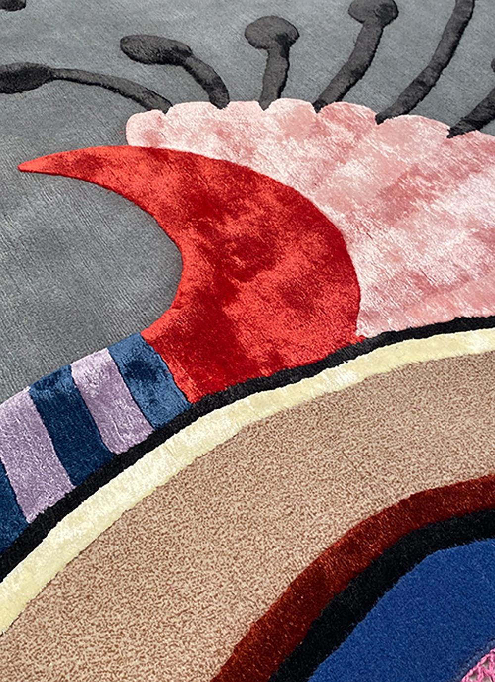 It’s a playful  hand-knotted rug made with Himalayan wool and natural silk, inspired by flora and organic shapes with vibrant colors and stylistic geometries that reflect artist’s eclectic vision and her personal take on interior design.

This rug
