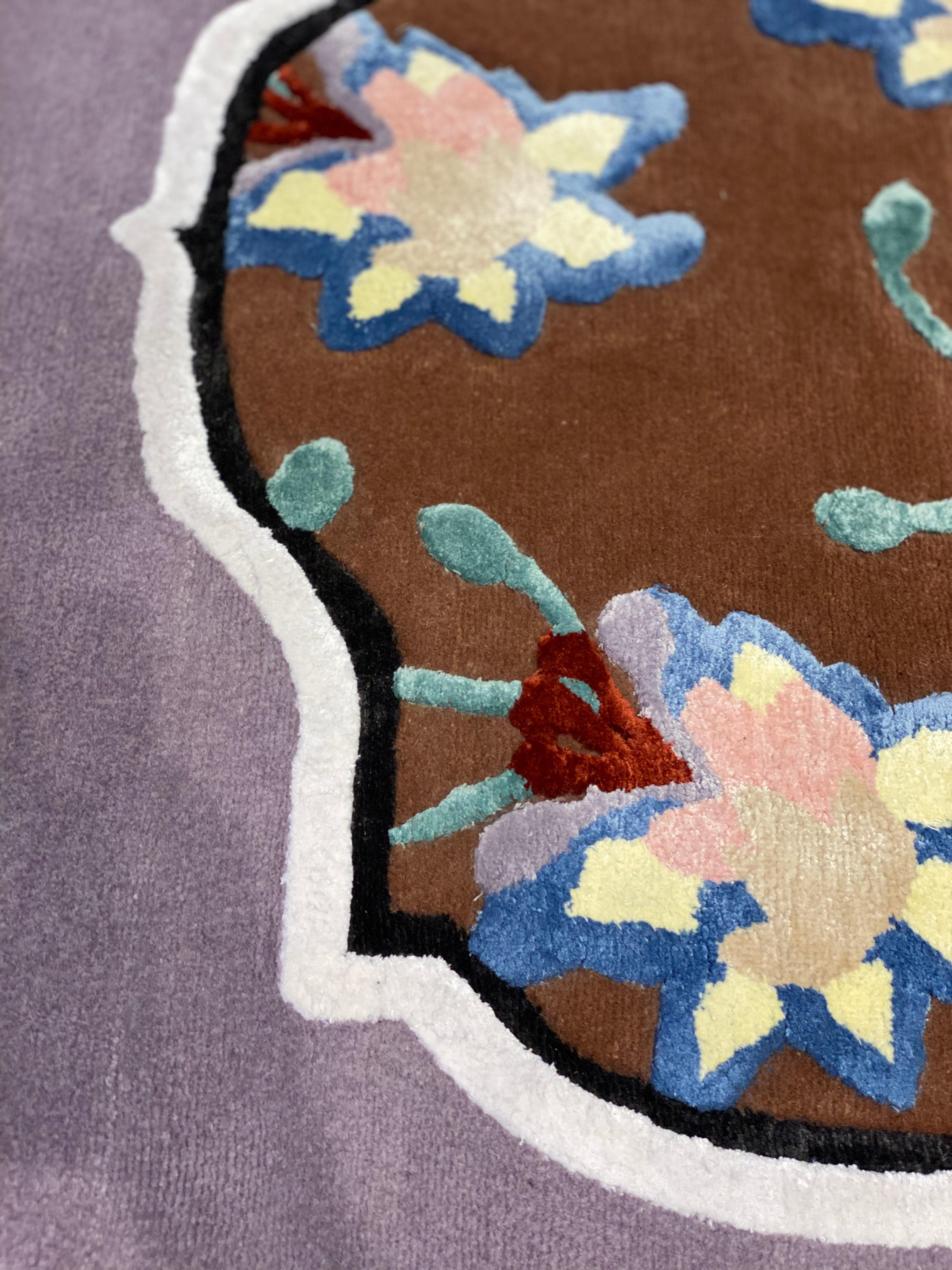 It’s a playful hand-knotted rug made with Himalayan wool and natural silk, inspired by flora and organic shapes with vibrant colors and stylistic geometries that reflect artist’s eclectic vision and her personal take on interior design.

This rug