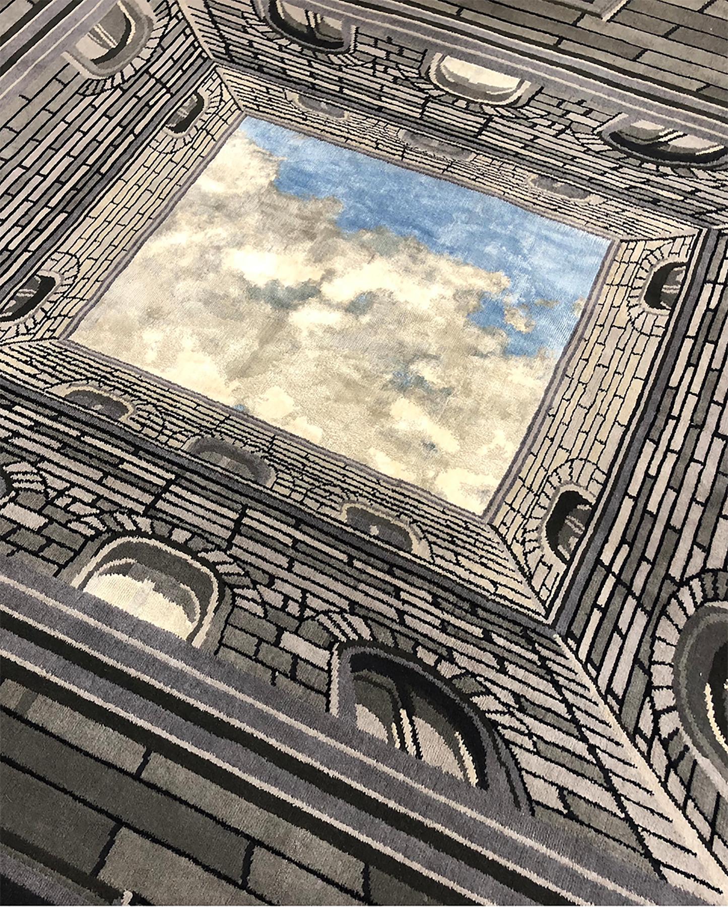 Inspired by the complex and refined creations of Baroque master architect Filippo Brunelleschi, Fabio Novembre designed this stunning rug boasting a magnificent trompe l'oeil with an open skyline at its center. This work of art is knotted by hand in
