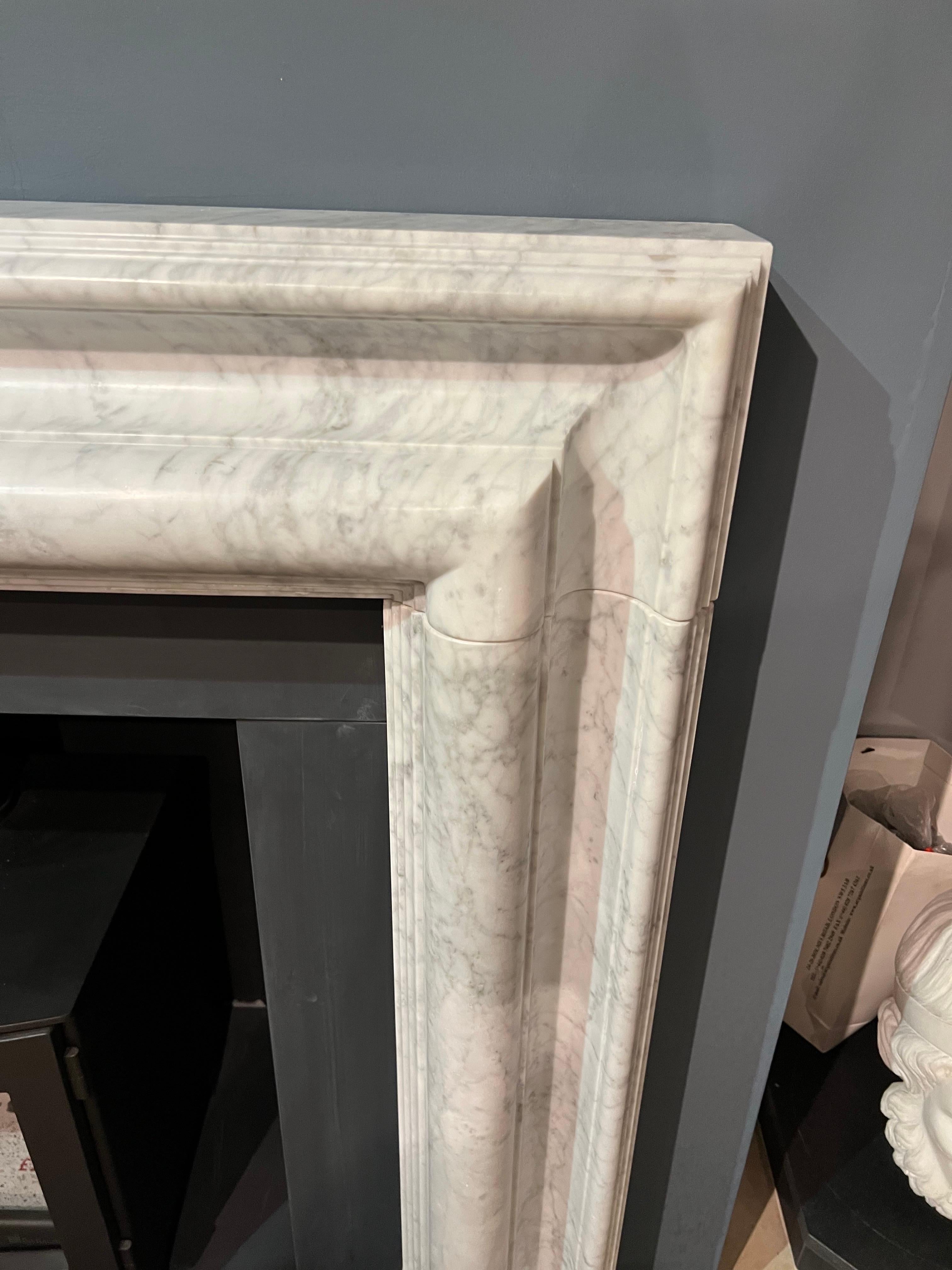 Carrara Marbel Bolection firepalce Surround
Hand carved 

Shelf Width 55.1/2