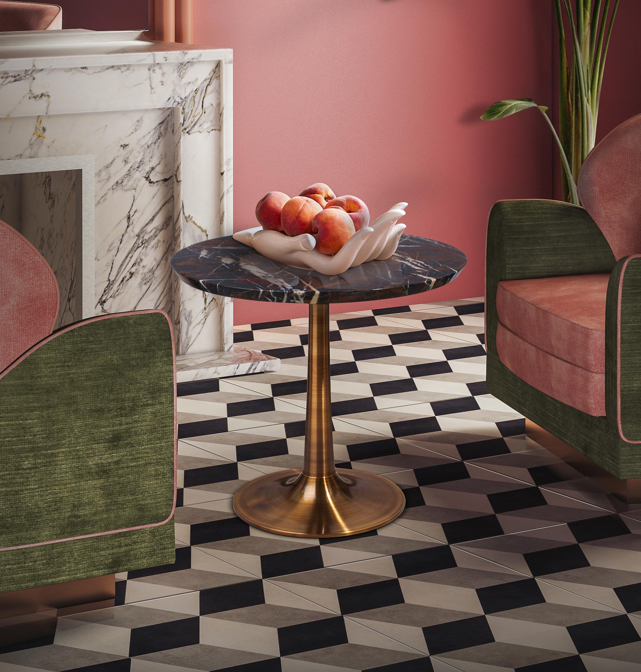 Carsland is a modern side table which blends a very contemporary style with one of the most precious stones in the world, black and gold marble. The top in black and gold marble, composed of recrystallized carbonate minerals, features a black color