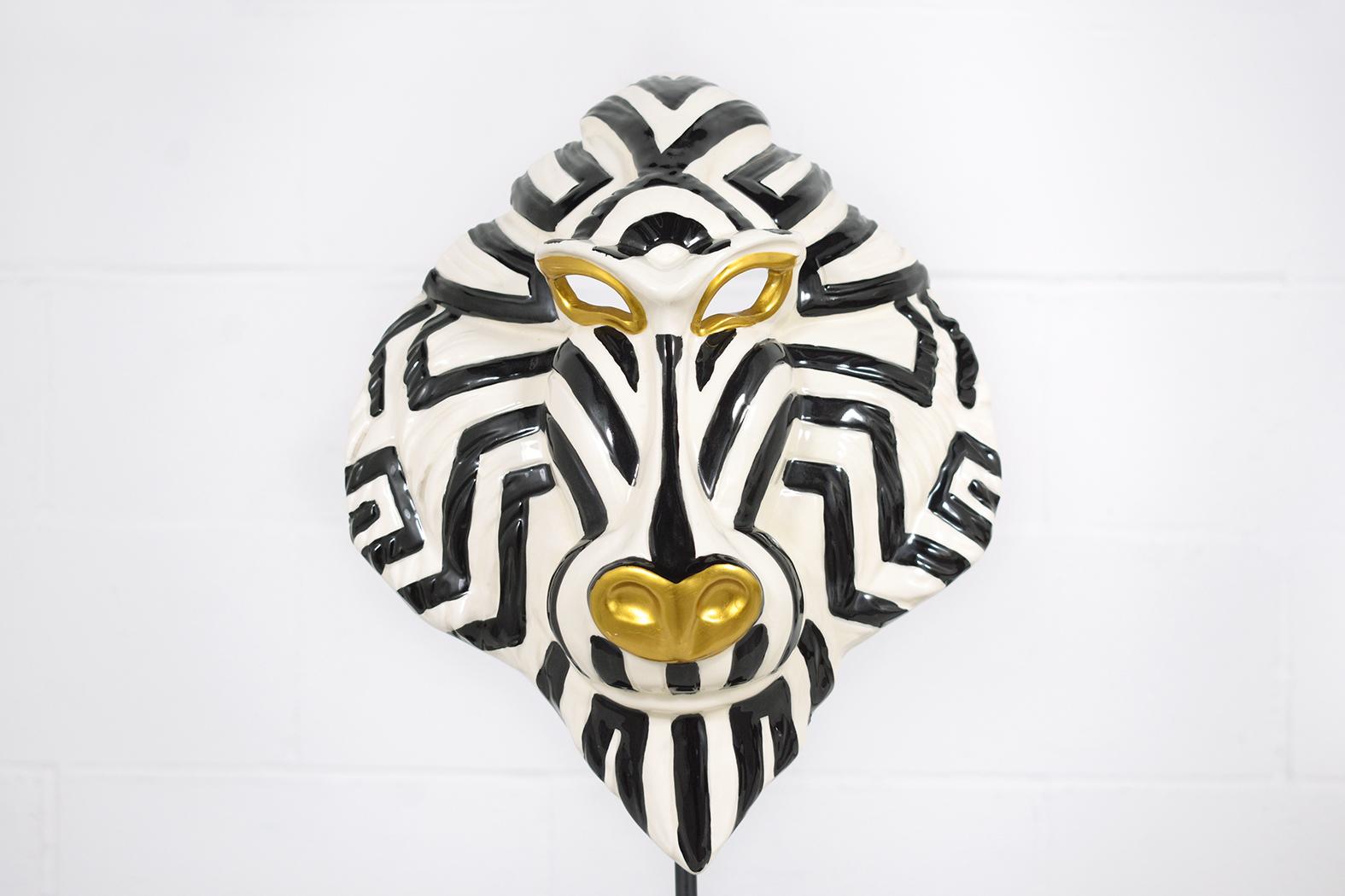 Immerse yourself in the beauty of contemporary artistry with our 21st-century Mandrill Mask, a hand-crafted masterpiece made from high-quality ceramic. This mask is in impeccable condition and showcases extraordinary craftsmanship that is sure to