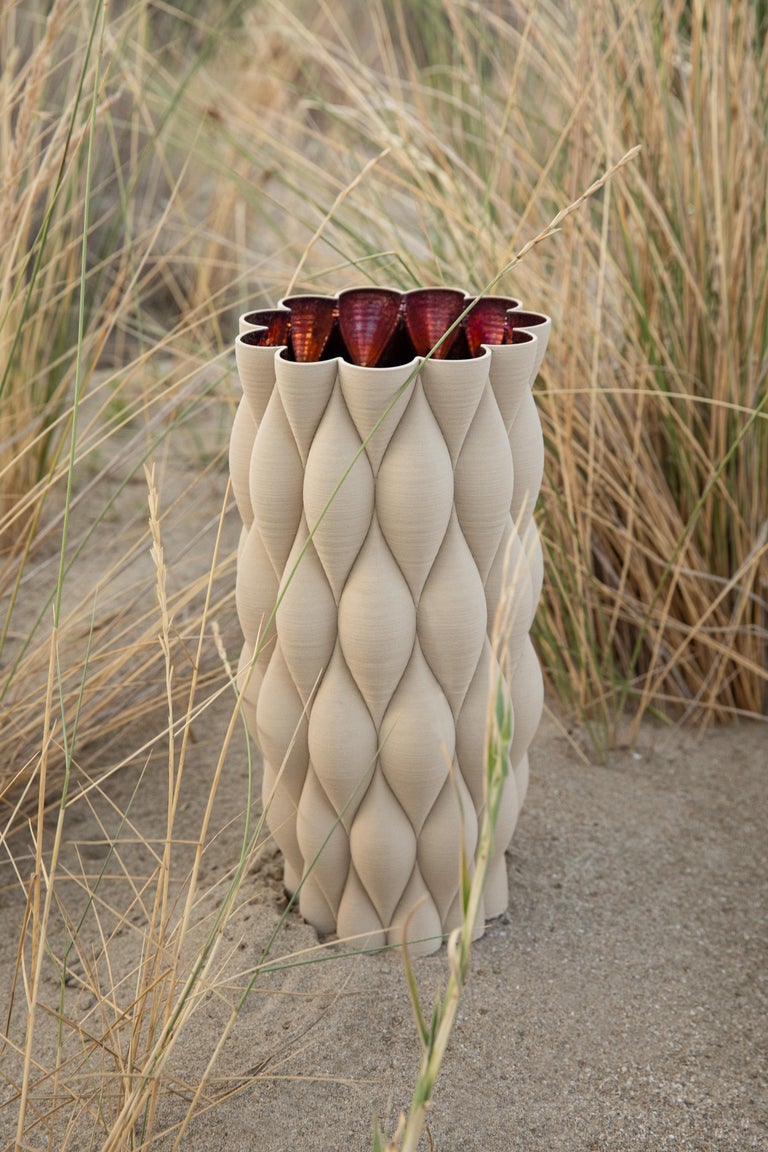 The New Delhi is part of the Mitti Vases collection, presented at the Milan Design Week Fuorisalone 2021 edition and created after a long trip to India. 
The collection explores different palettes and surfaces, using unfinished stoneware that feels