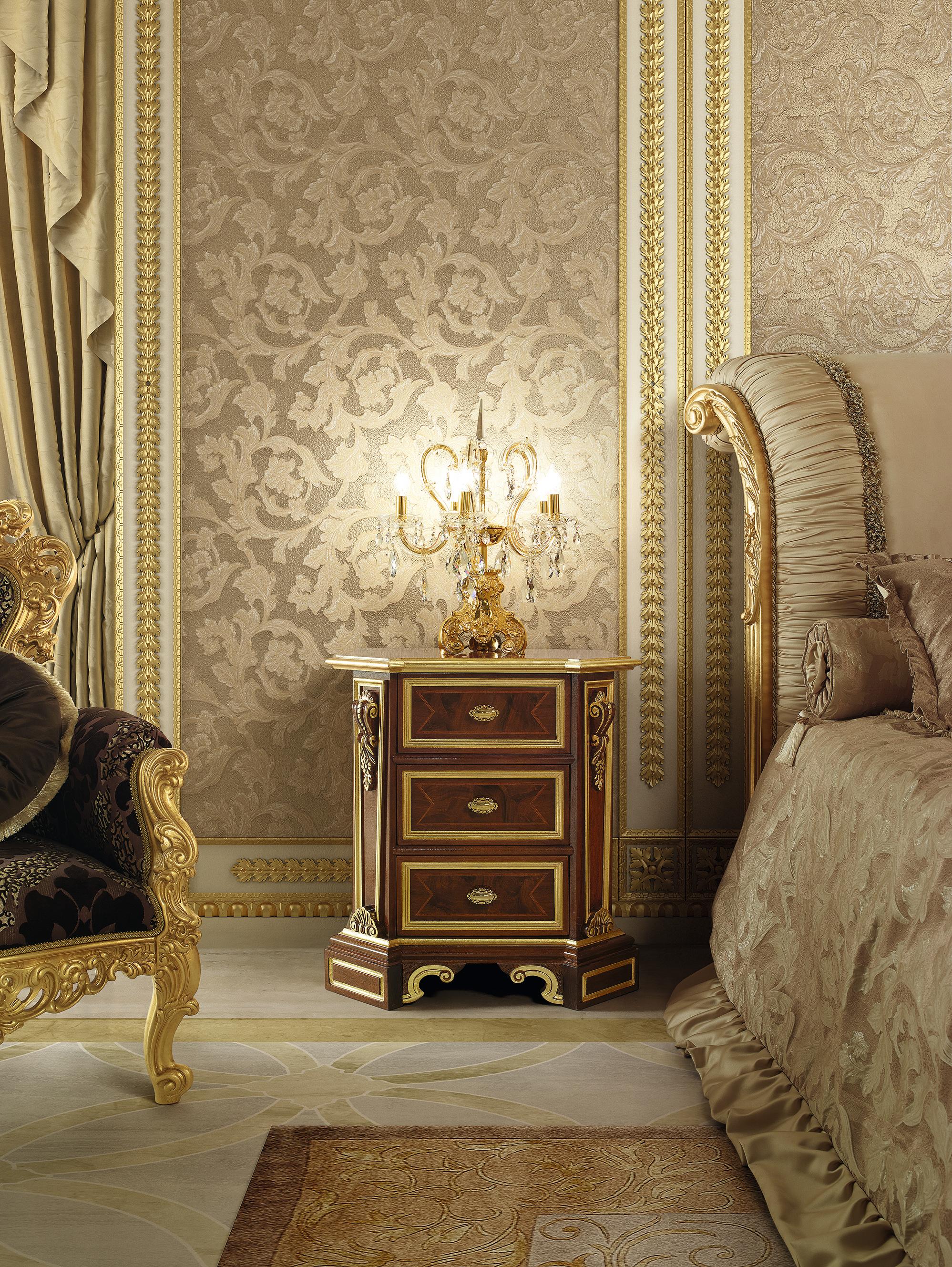Preciously designed squared classic night stand with three drawers by Modenese Gastone Interiors. The precious carvings in this night table make it perfect for beds with carved headboards and high-end wardrobes, cabinets or credenzas, and the gold
