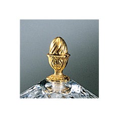 Siglo XXI, Caja de cristal transparente y bronce dorado