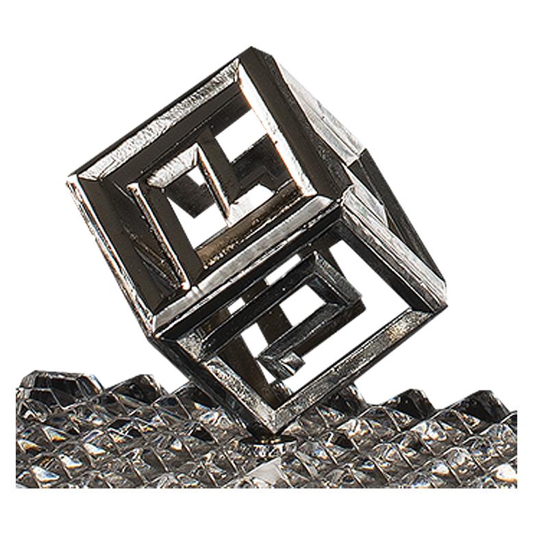 21st century, clear hand-carved crystal, chromed bronze  box with intricate detailing and a bold geometric style. The domed lid features a radiant sunburst pattern, topped with a unique double-square handle that recalls classic Art Deco motifs. The