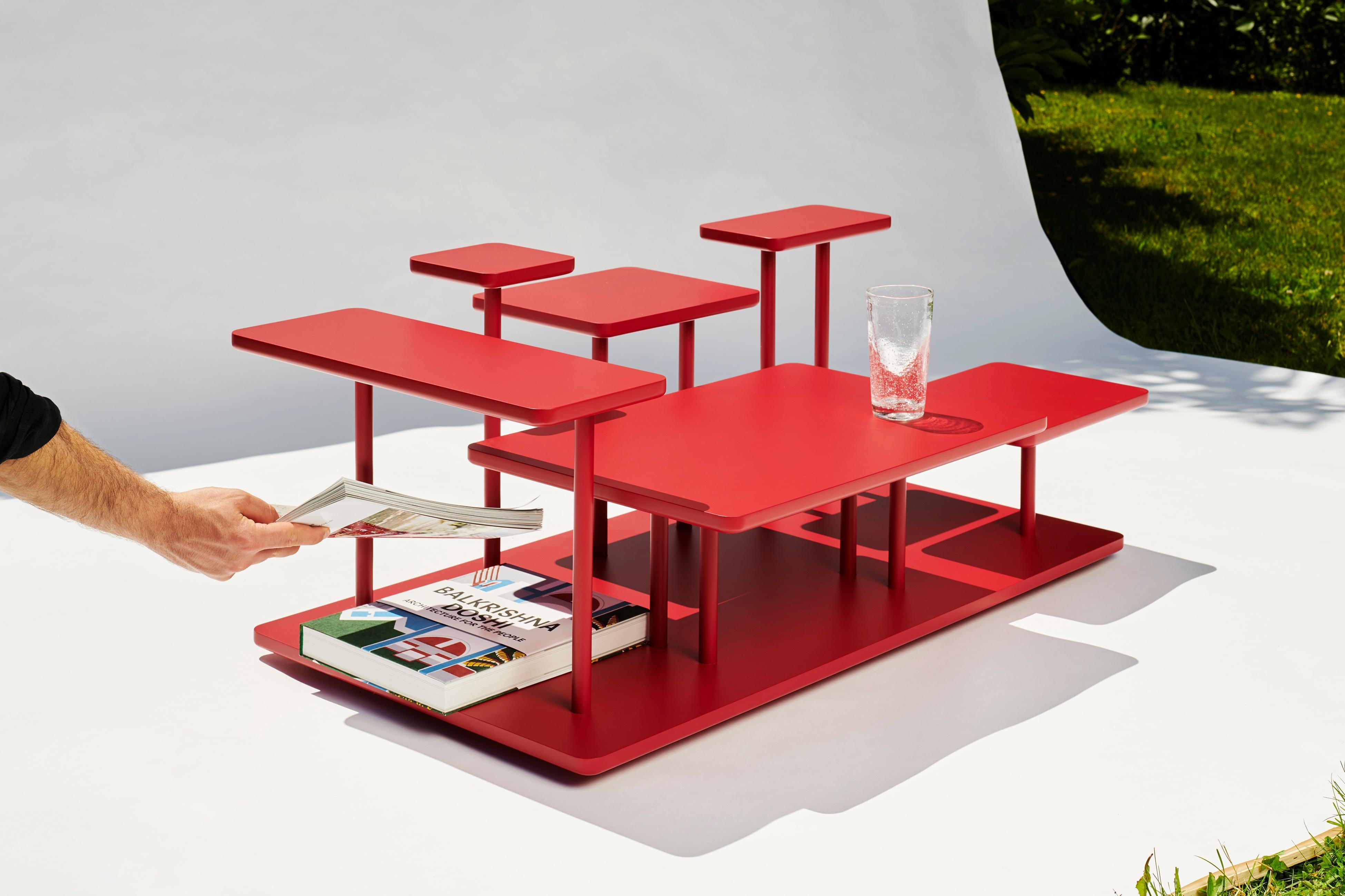 Isole is an elegant coffee table which challenges conventional shapes and creates a fluid and sculptural collage of whatever objects you decide to display on it. It consists of six separate surfaces of varying sizes, mounted at diverse heights on