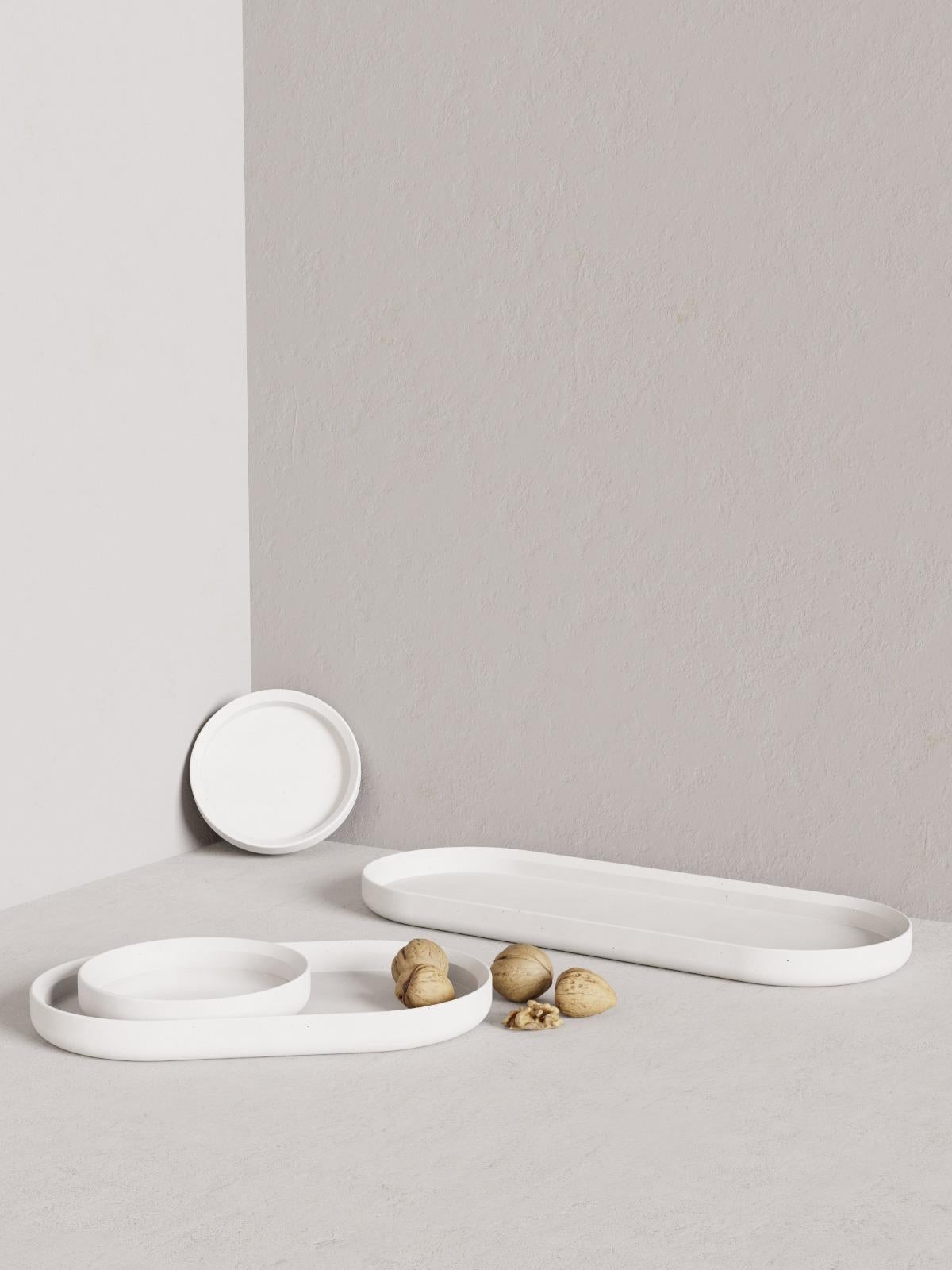 Renzo in a family of multipurpose trays with a very smooth surface and soft curved edges, now available in a different color composition. Each piece is a unique, no two are the same.

Mod III Measure: 60 x 23 x 4cm.